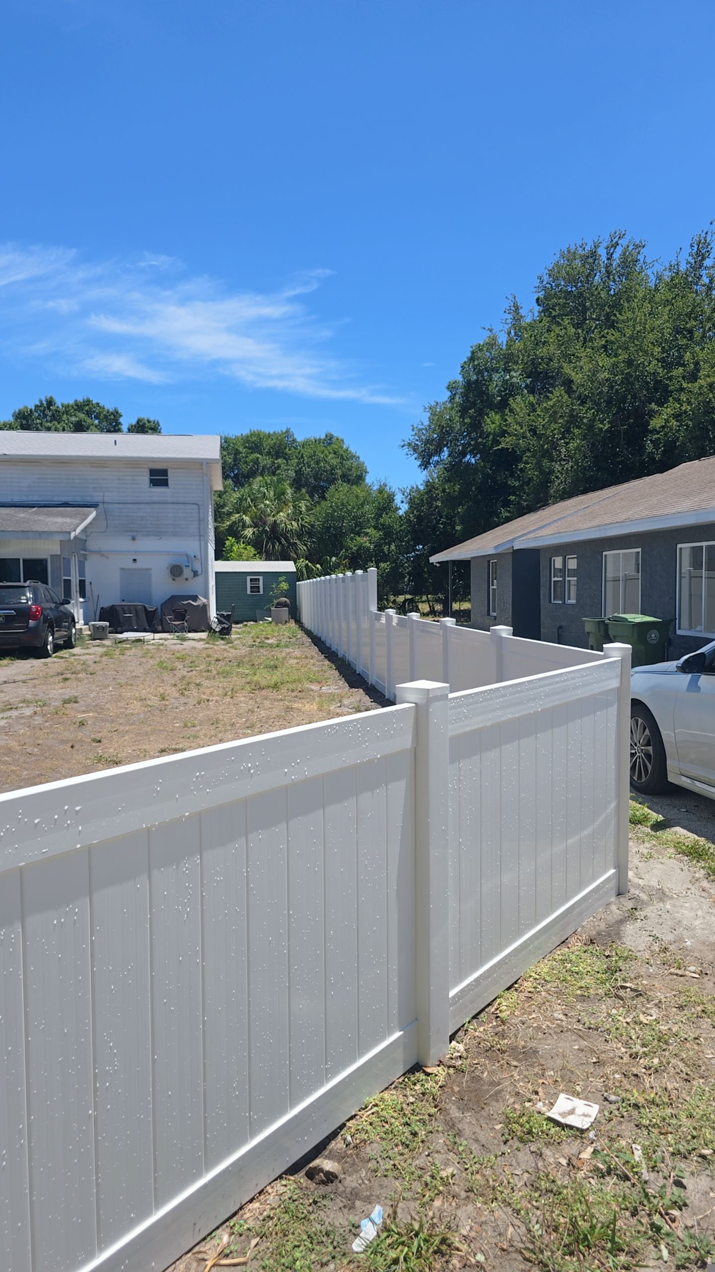 White Vinyl Privacy Fence and Gate Installation in Bradenton by True Fence LLC