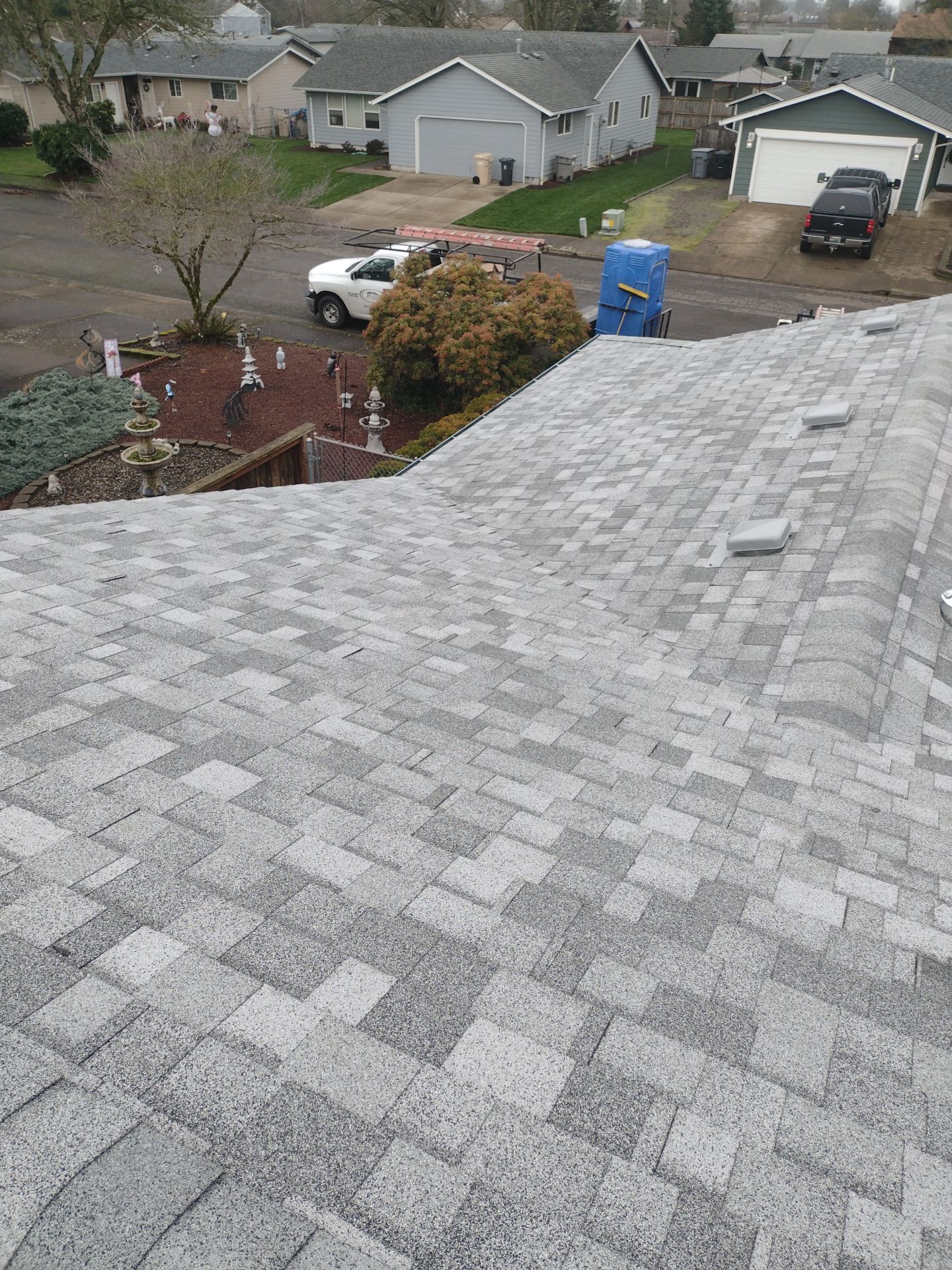 Residential Roofing Installation using IKO Dynasty (Color: Frostone Grey) by Orezona Building & Roofing Company, Inc.