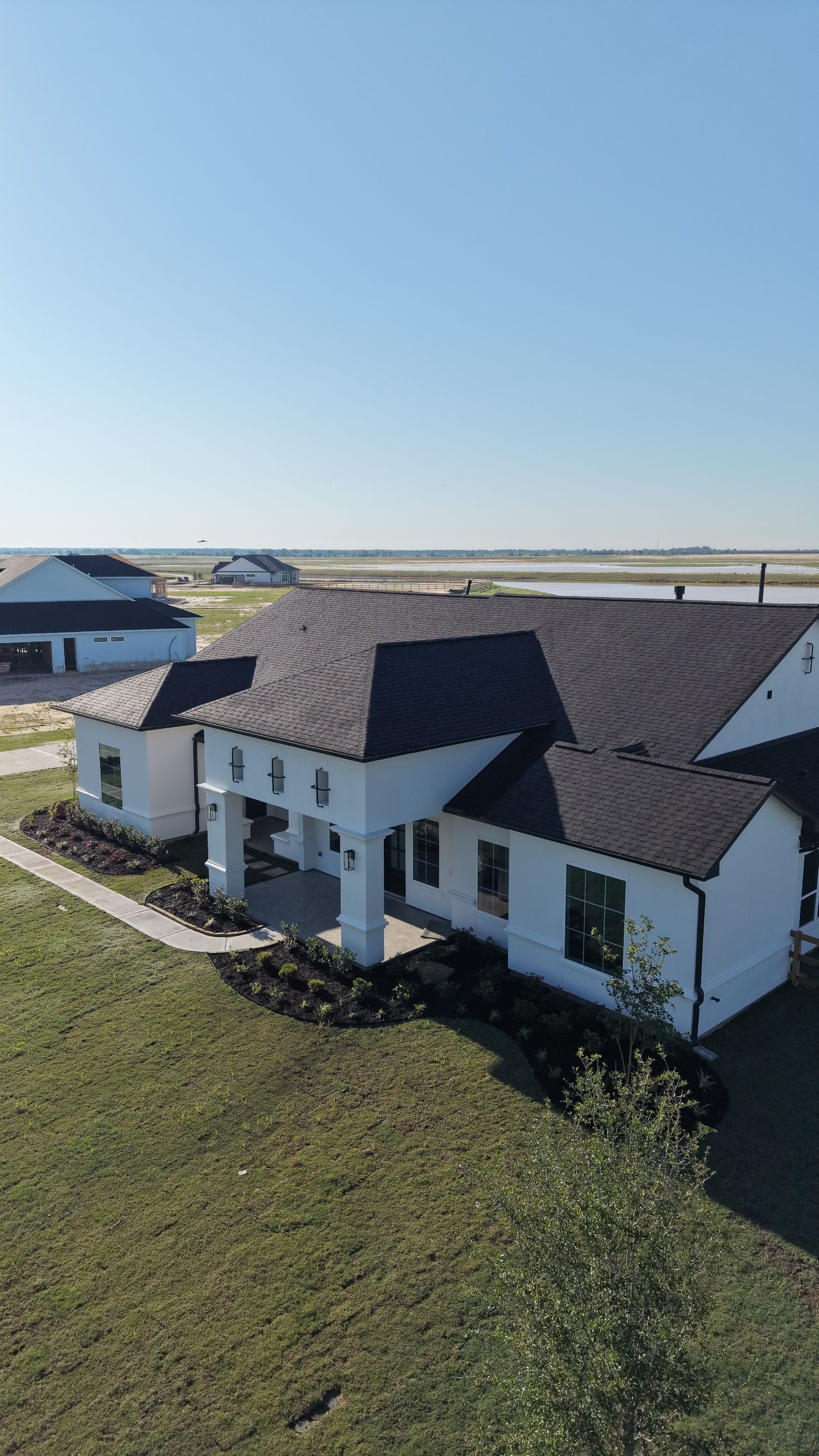Custom Stucco Masterpiece with Precision Foam Detailing – Waller, TX by Apex Conventional Stucco Llc