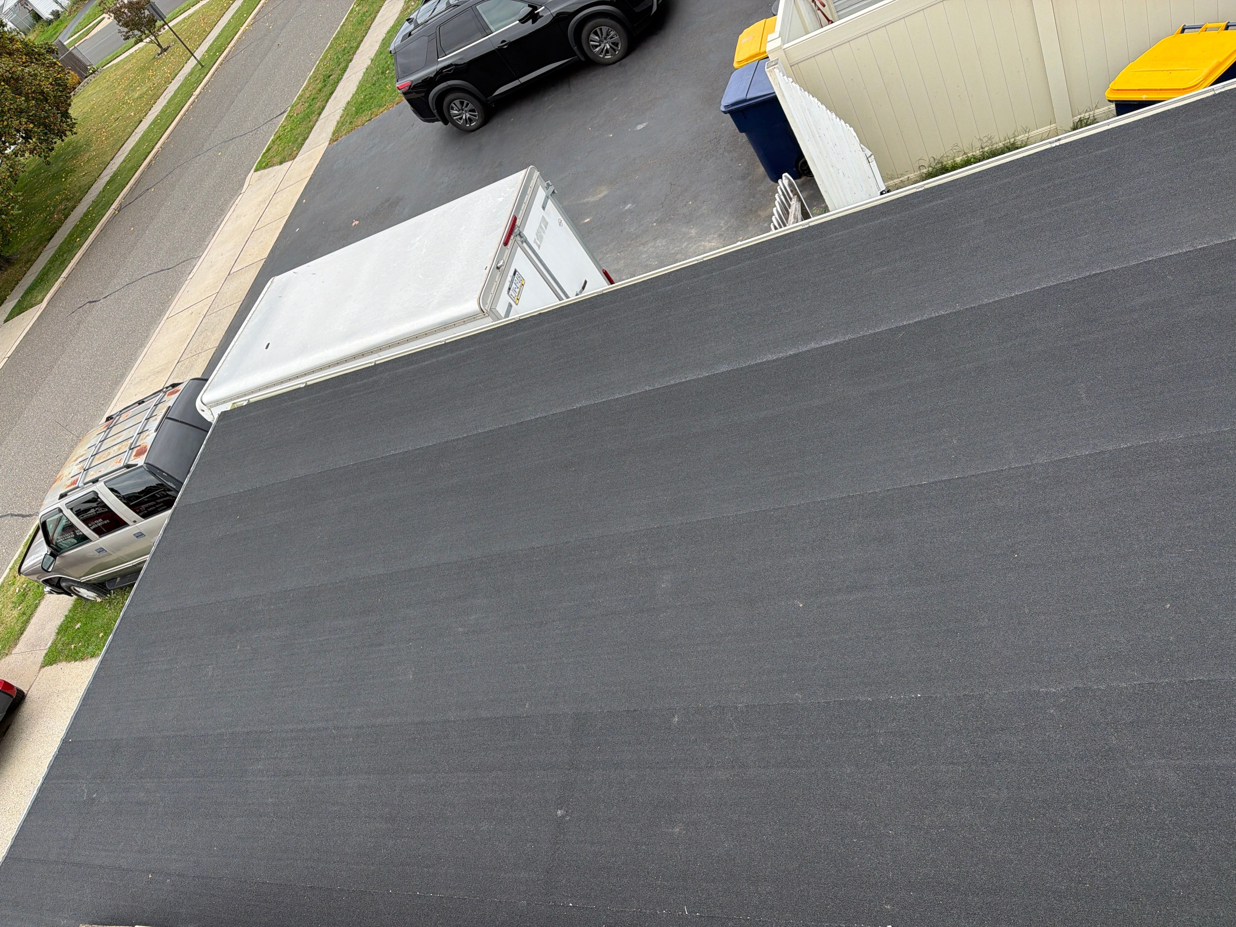 Flat Roof Replacement and Shingle Integration in Levittown by Stofan Construction LLC