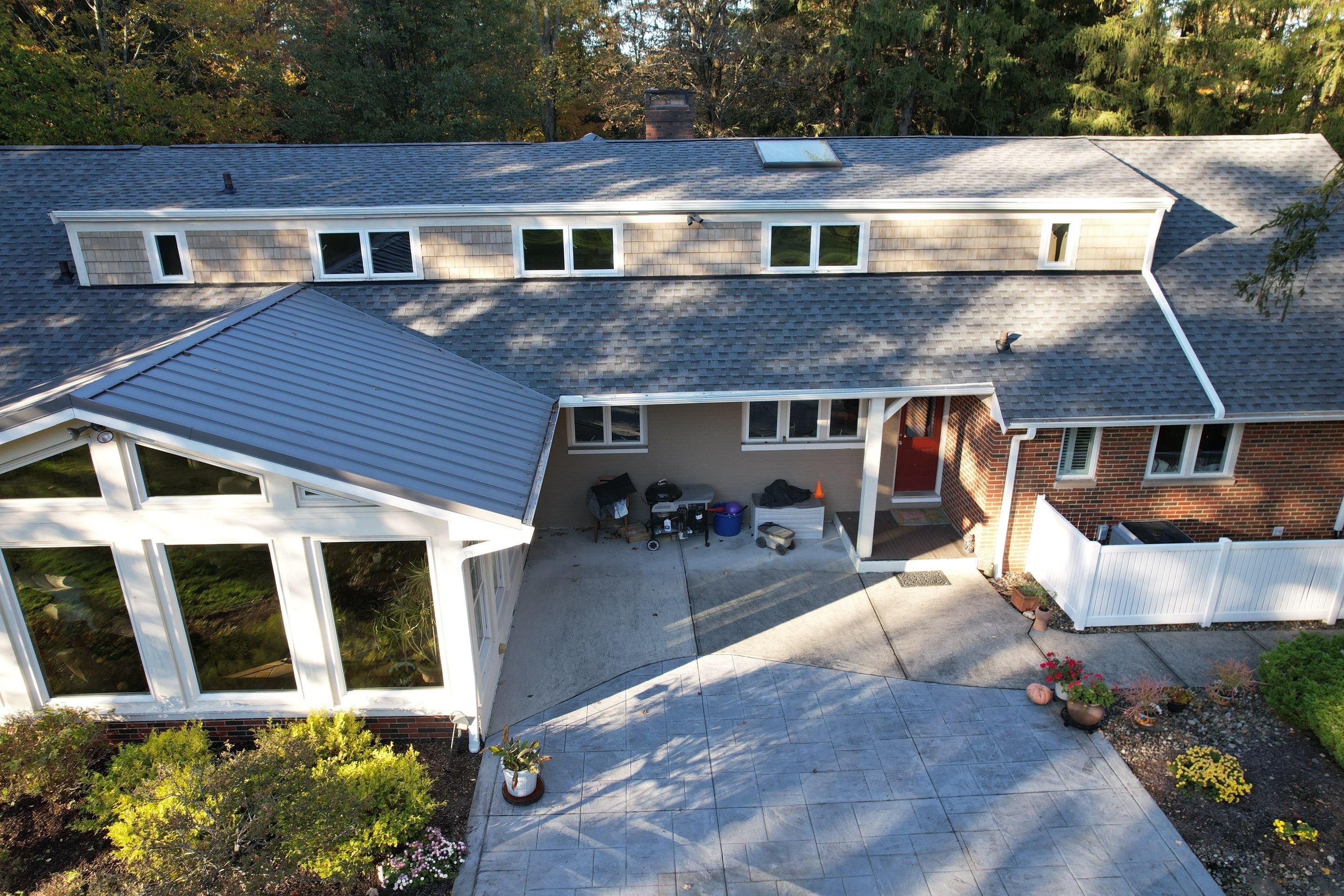 Moreland Hills Roof + Gutters Replacement by Atlas Roofing & Restoration