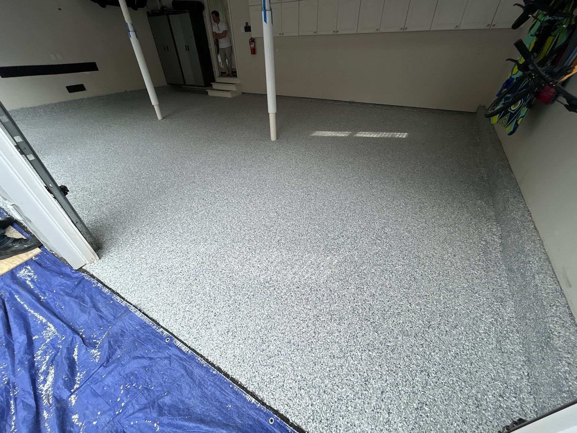 Concrete Floor Coating Transformation by DiGiorgi Roofing and Siding Inc