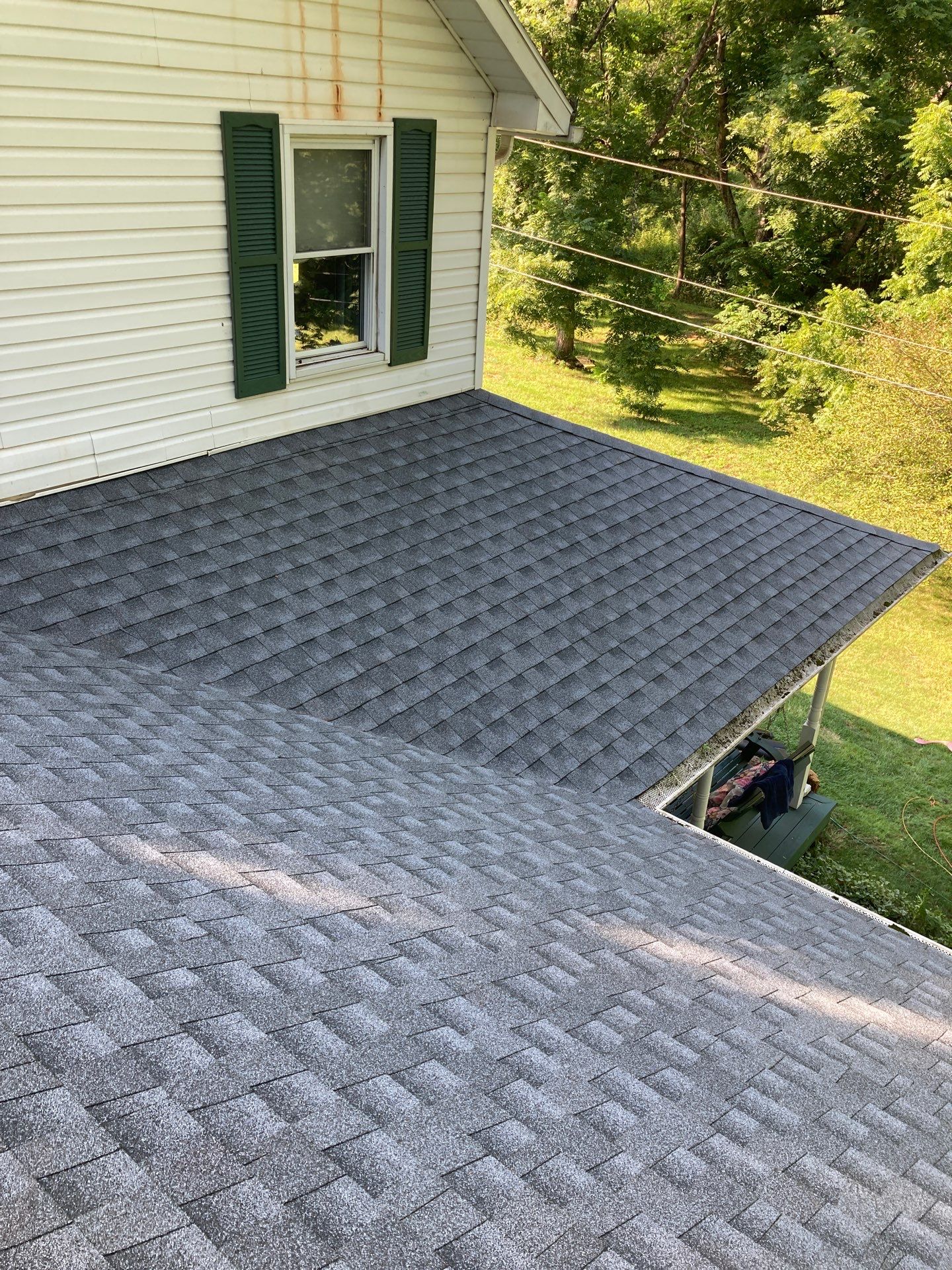 Residential Roofing Installation using GAF Timberline HDZ Oyster Grey by Rainstoppers Roofing