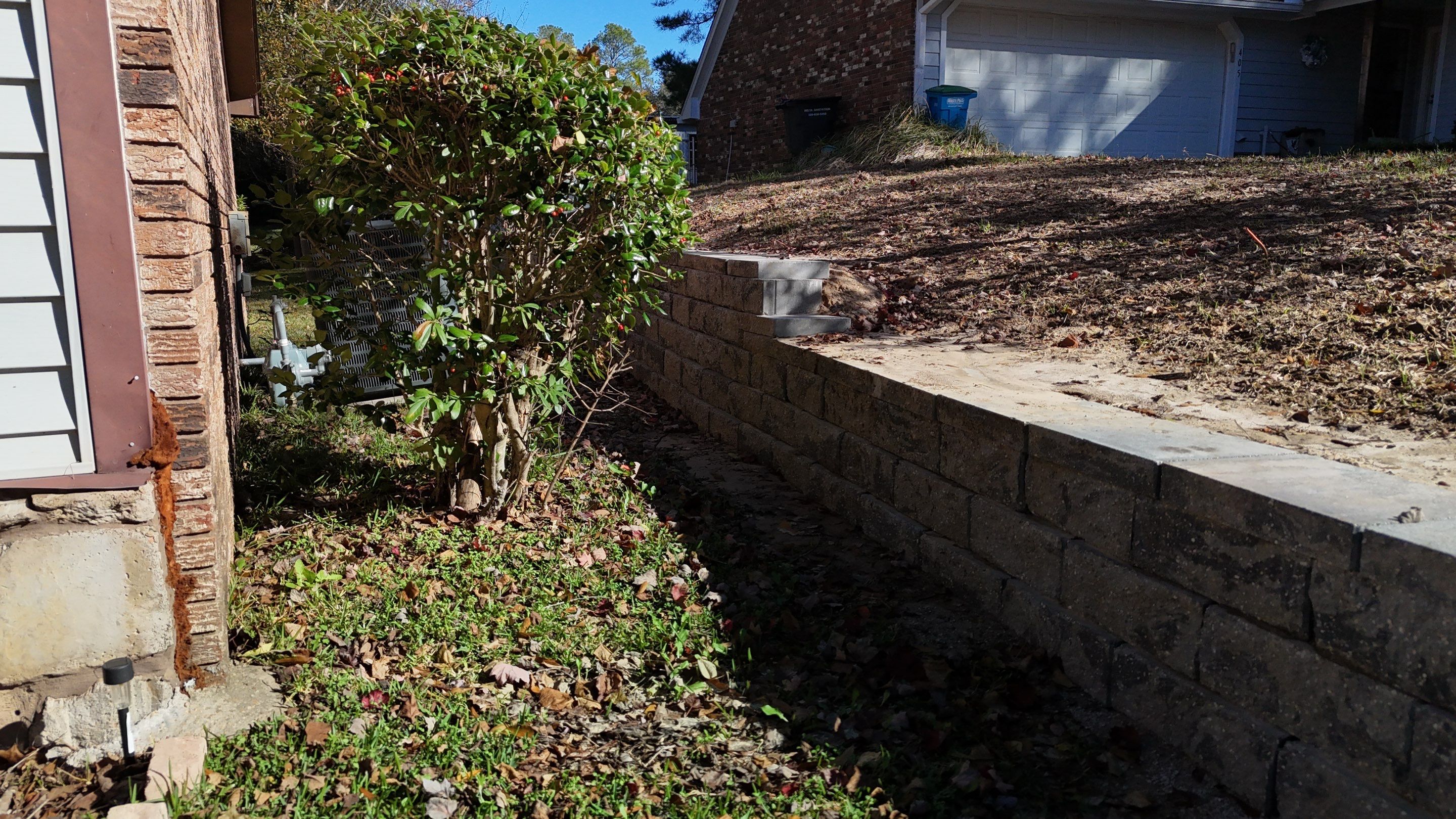Elegant Stone Retaining Wall by Roberson Construction LLC