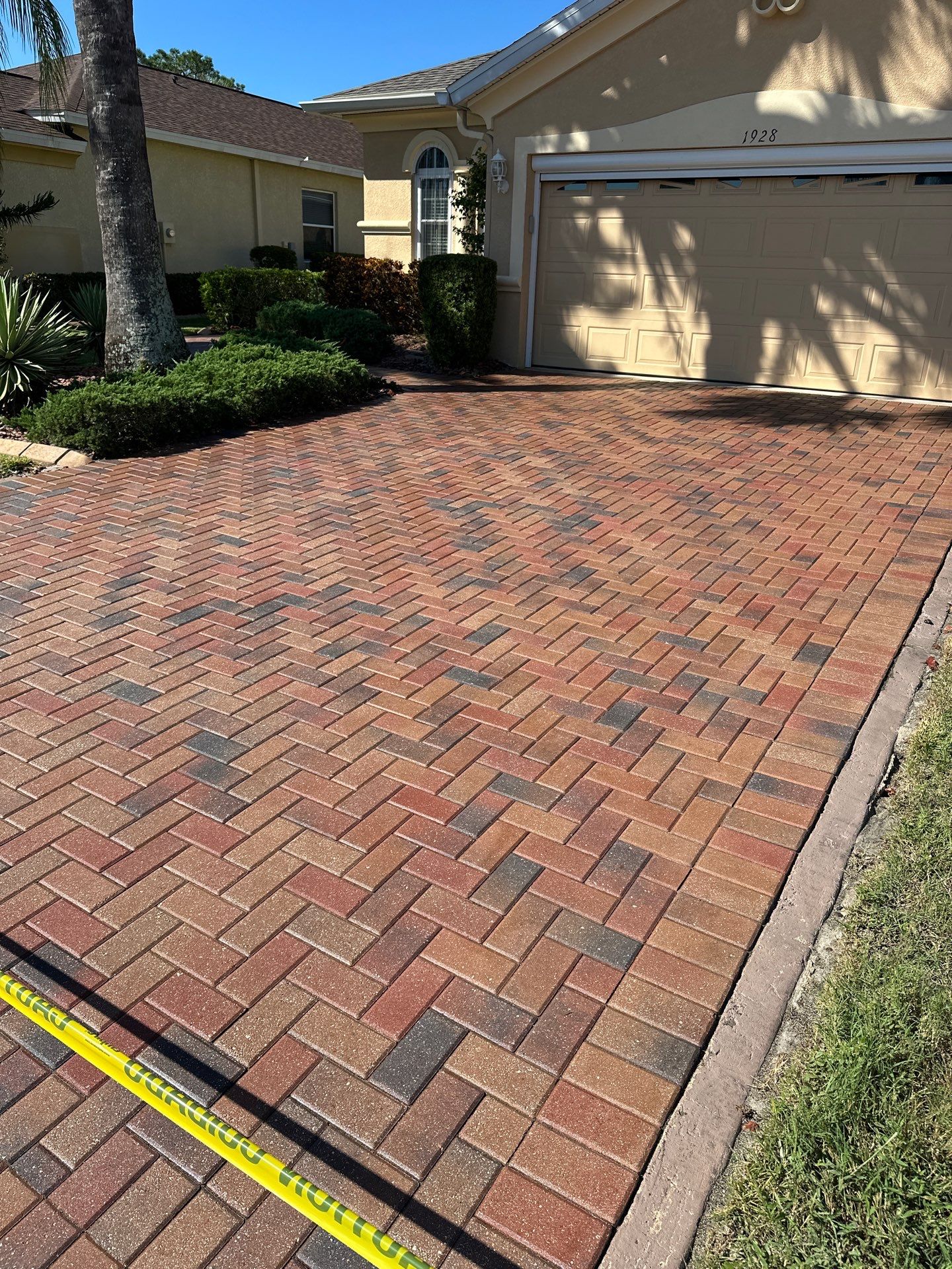 Restoring Multi-Tone Paver Driveway and Walkways in Sun City Center by Supreme Paver Experts