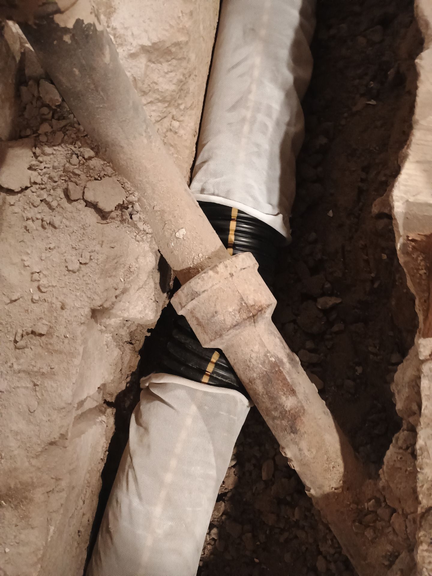Interior Drain Tile & Buried Discharge in St. Anthony, MN by Waterproofing Northeast