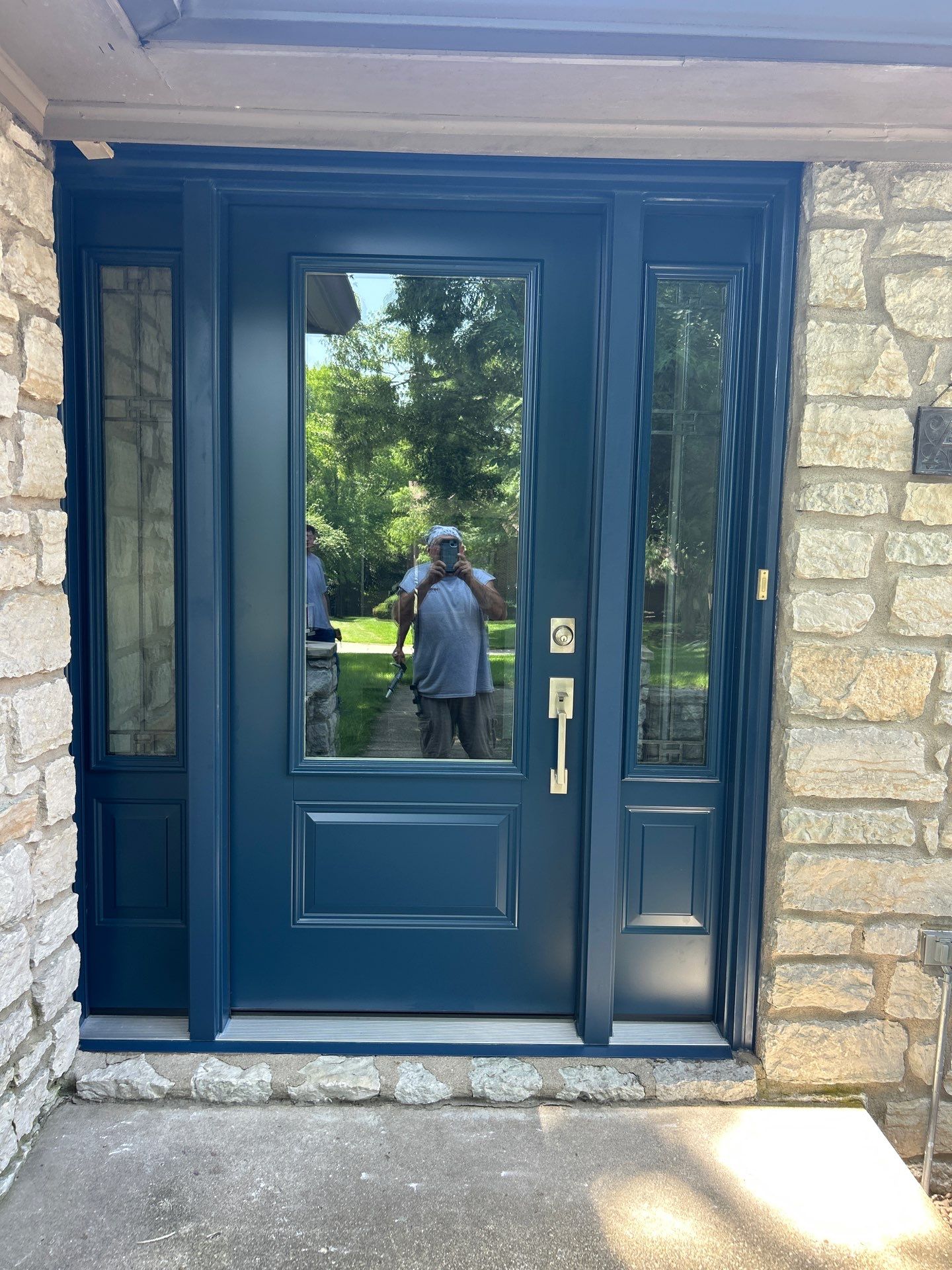 Custom Front Entry and Sliding Patio Door Replacement in Greenwood by Merrifield Exteriors, LLC