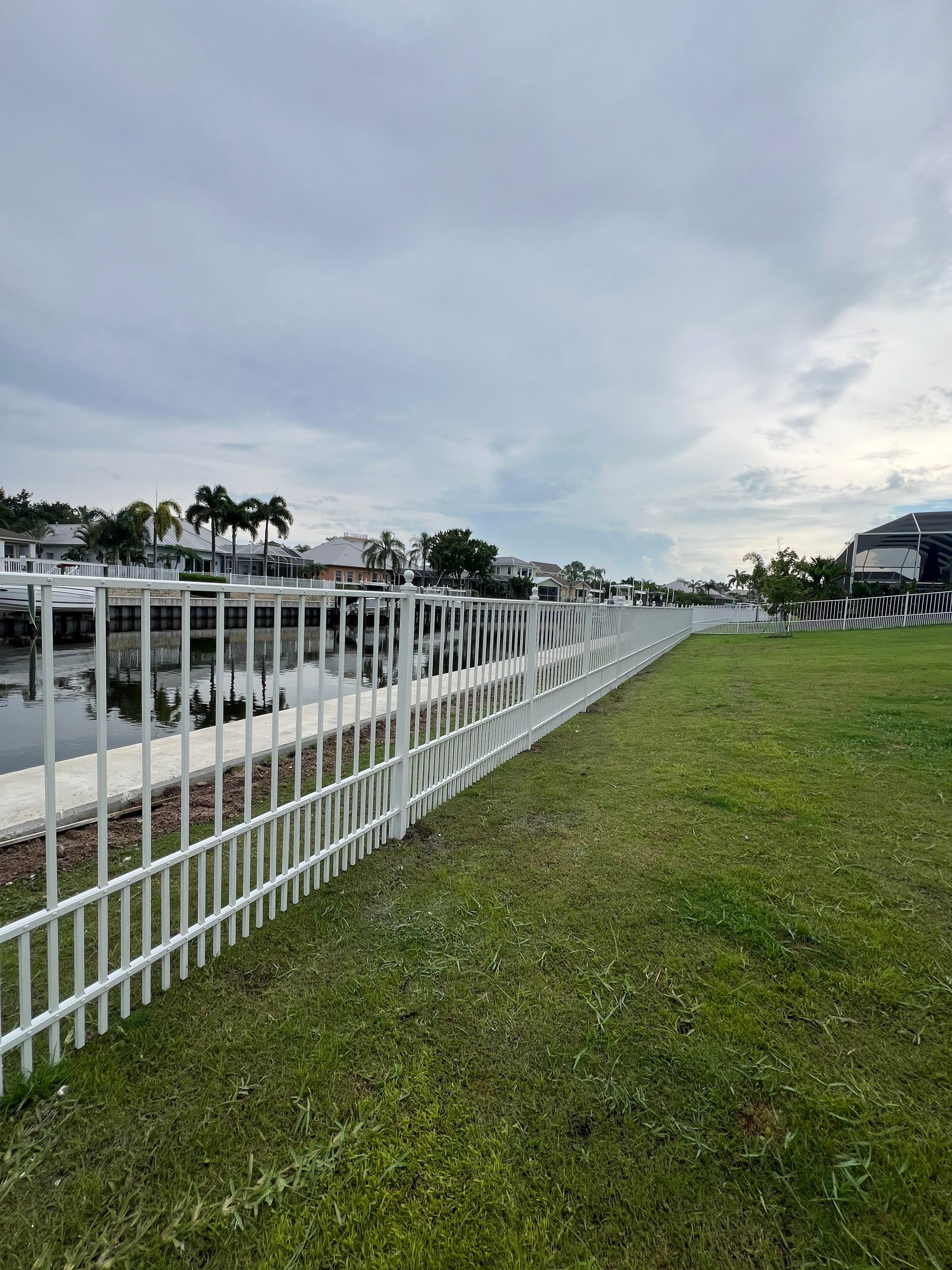 Aluminum Fence Installation using White Aluminum Puppy Picket Fence by Asap fence and gates, LLC