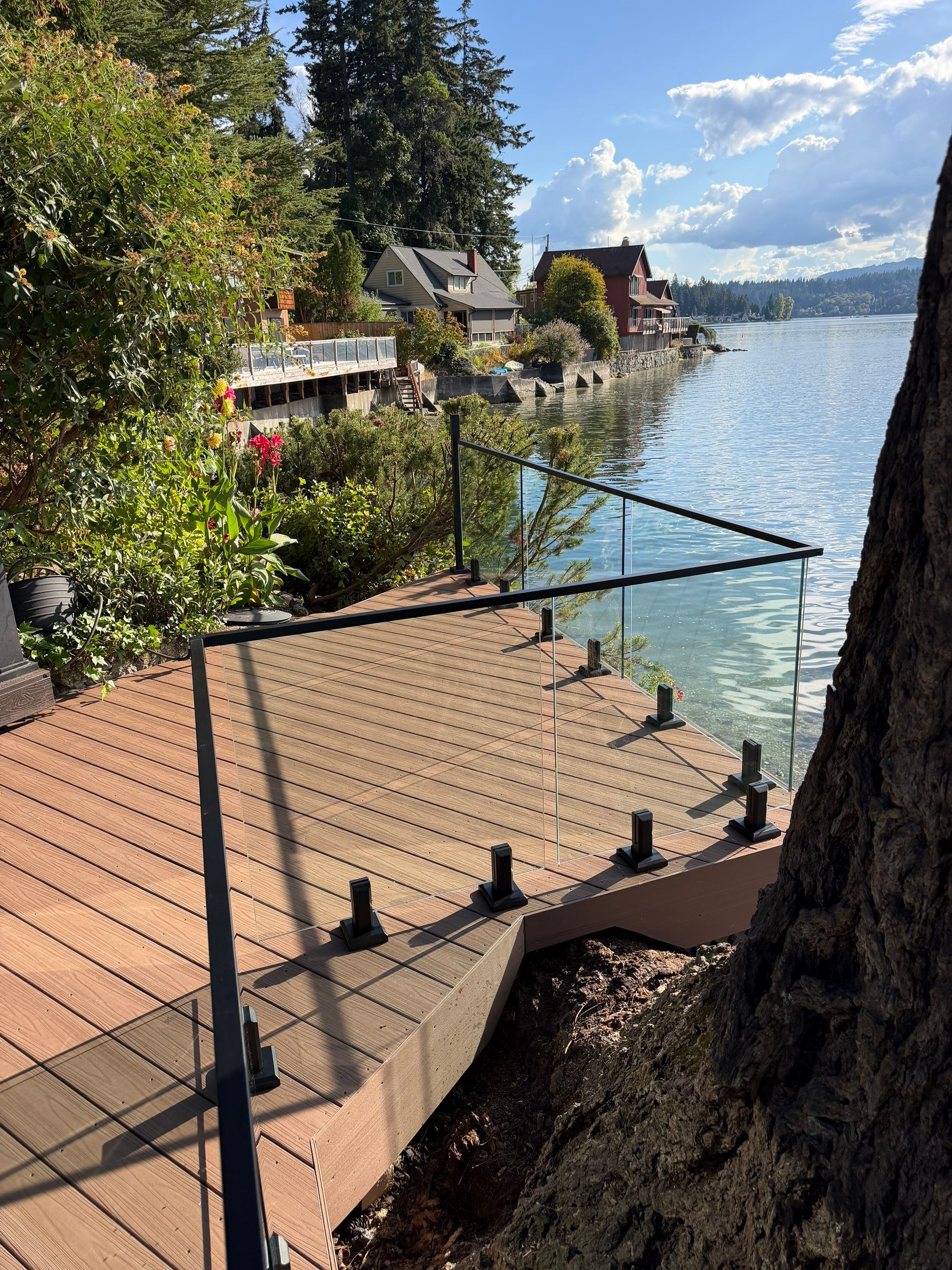 Waterfront Composite Deck and Fieldstone Retaining Wall in Bremerton