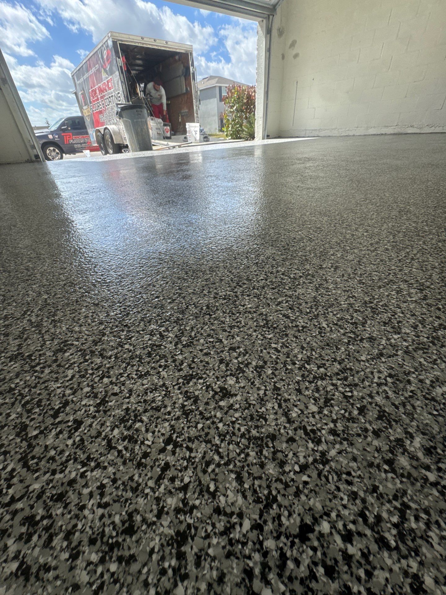 The Domino Effect: Ultimate Showroom Garage by Performance Floors & Coating