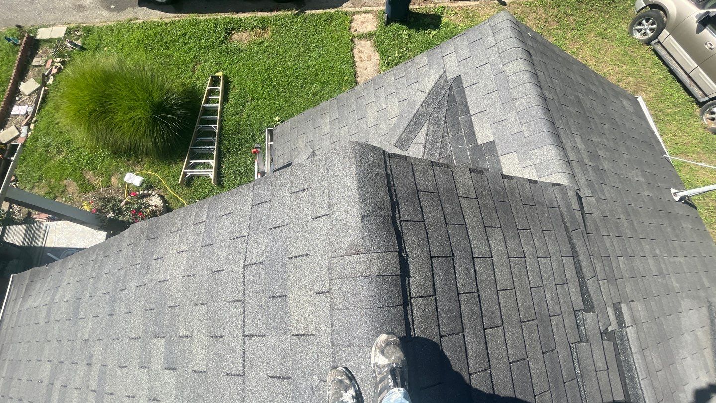 Residential Roofing Installation using Performance Shingles by Mr. Roofer