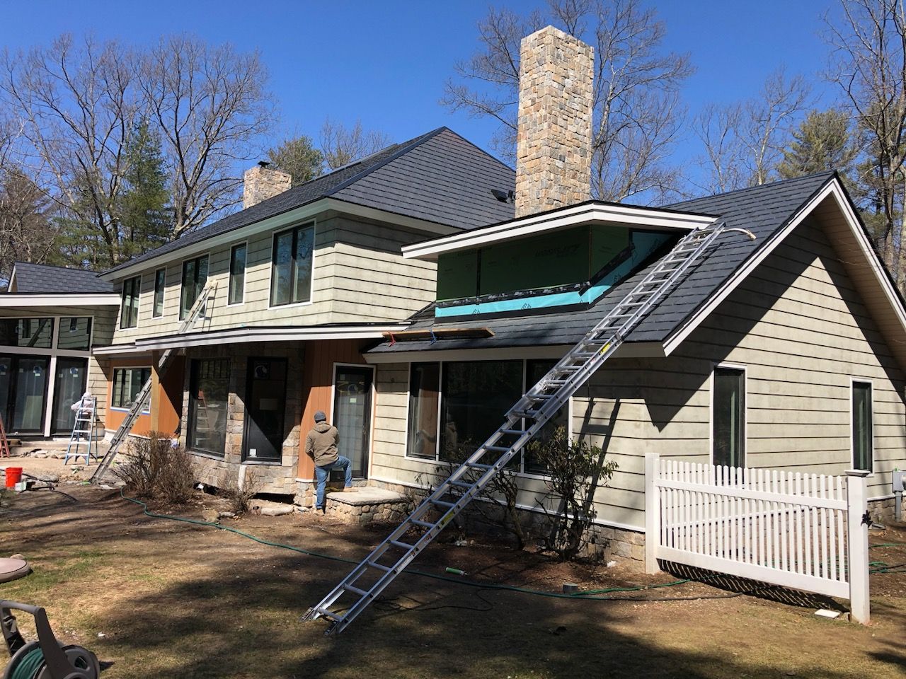 Siding in Weston,  MA by UBrothers Construction
