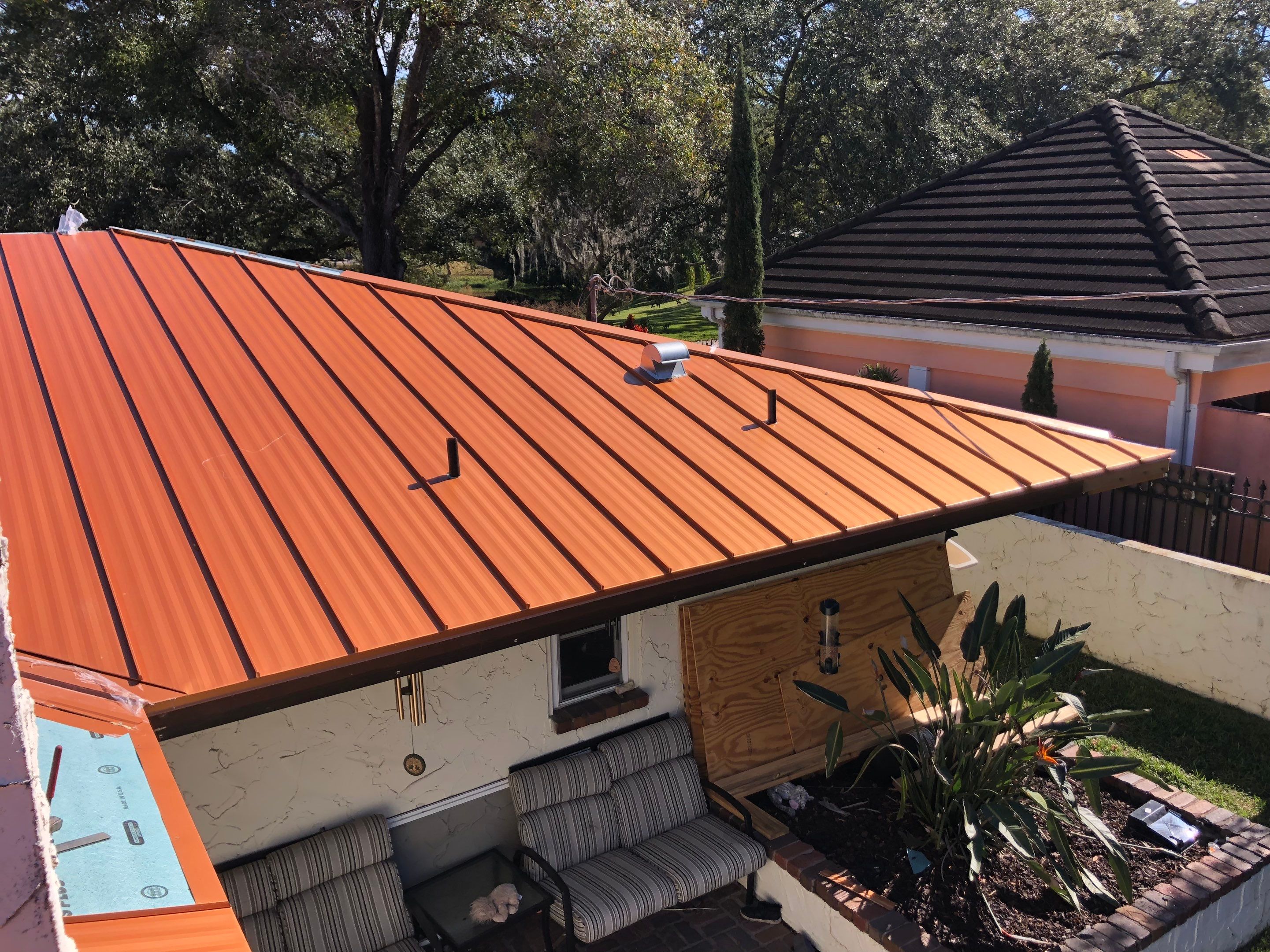 Residential Re-Roof using MS Metals, Copper Penny, Standing Seam. by First Due Roofing