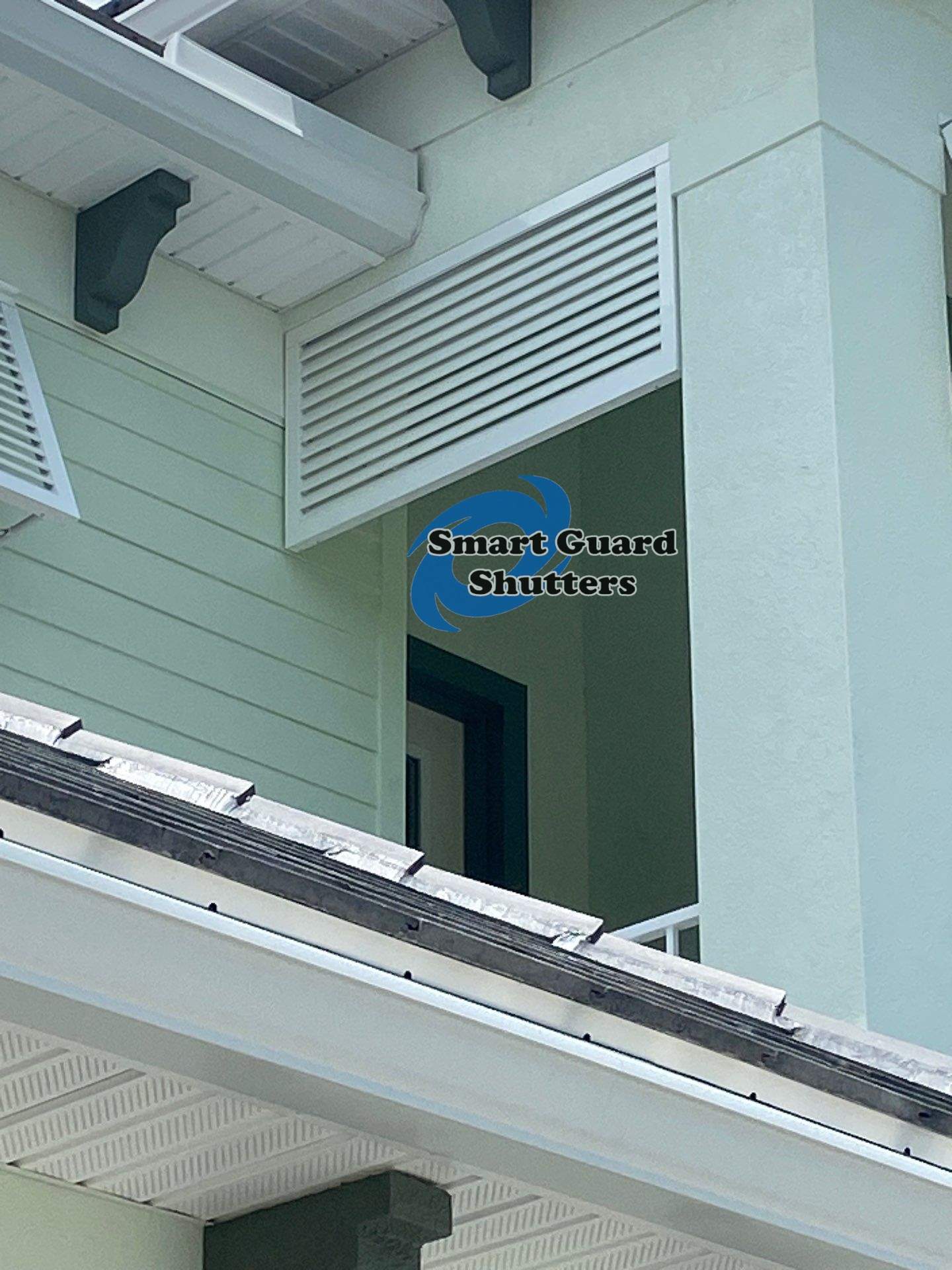 Decorative Bahama Shutters in Traffic White by Smart Guard Shutters