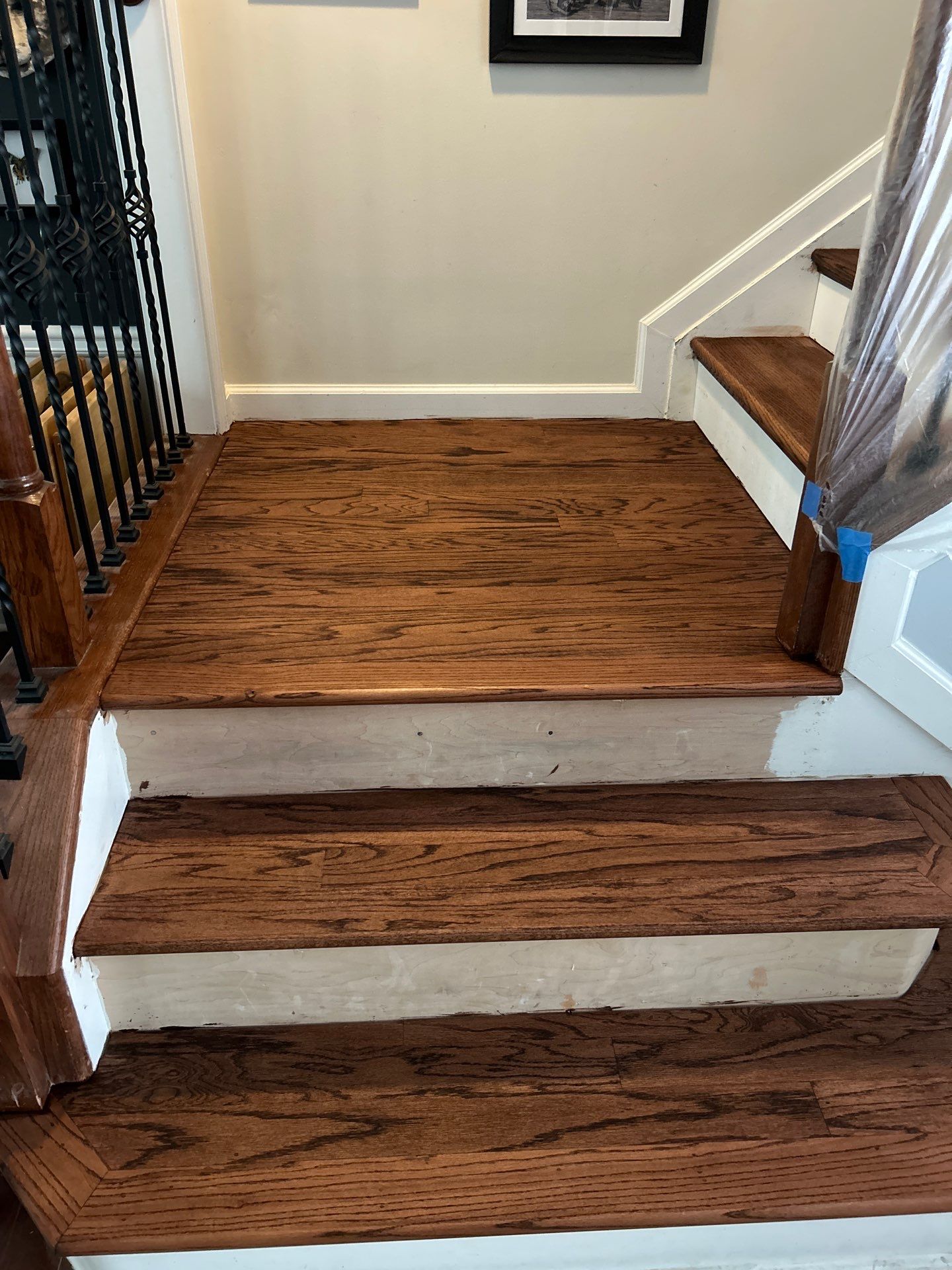 UPGRADE to solid oak stair treads by Footprints Floors of East Atlanta