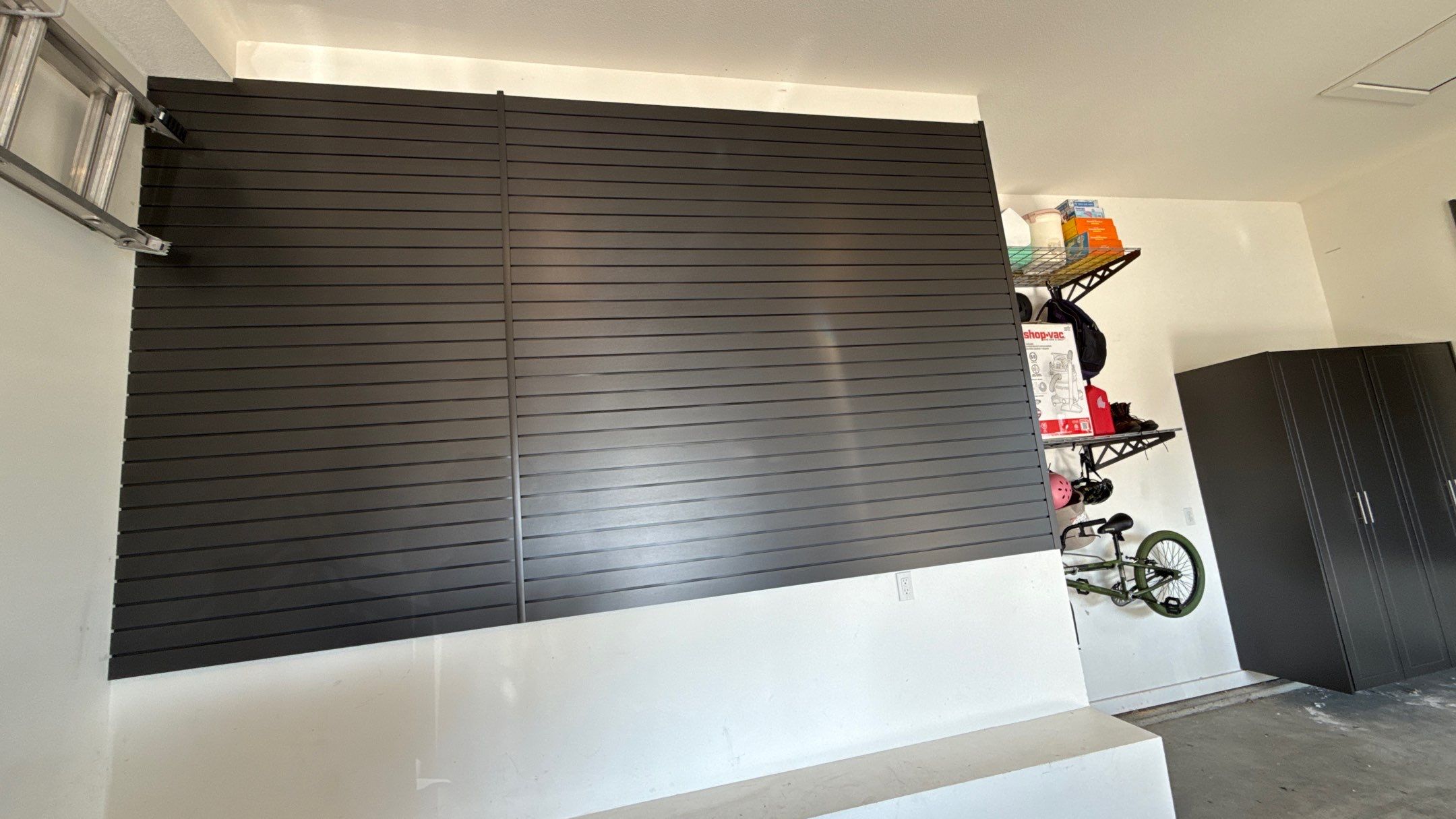 Brad To His Slatwall To The Max by Banner Garage