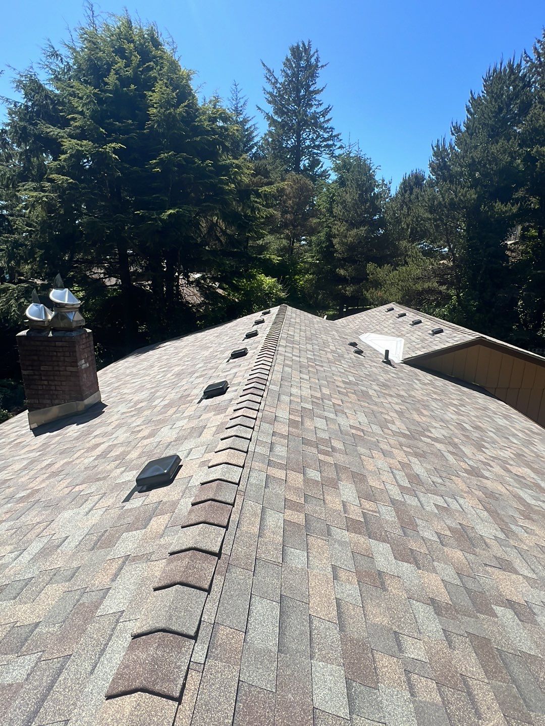 Residential Roofing Installation using Malarkey Highlander with GAF 60mil TPO by Orezona Building & Roofing Company, Inc.
