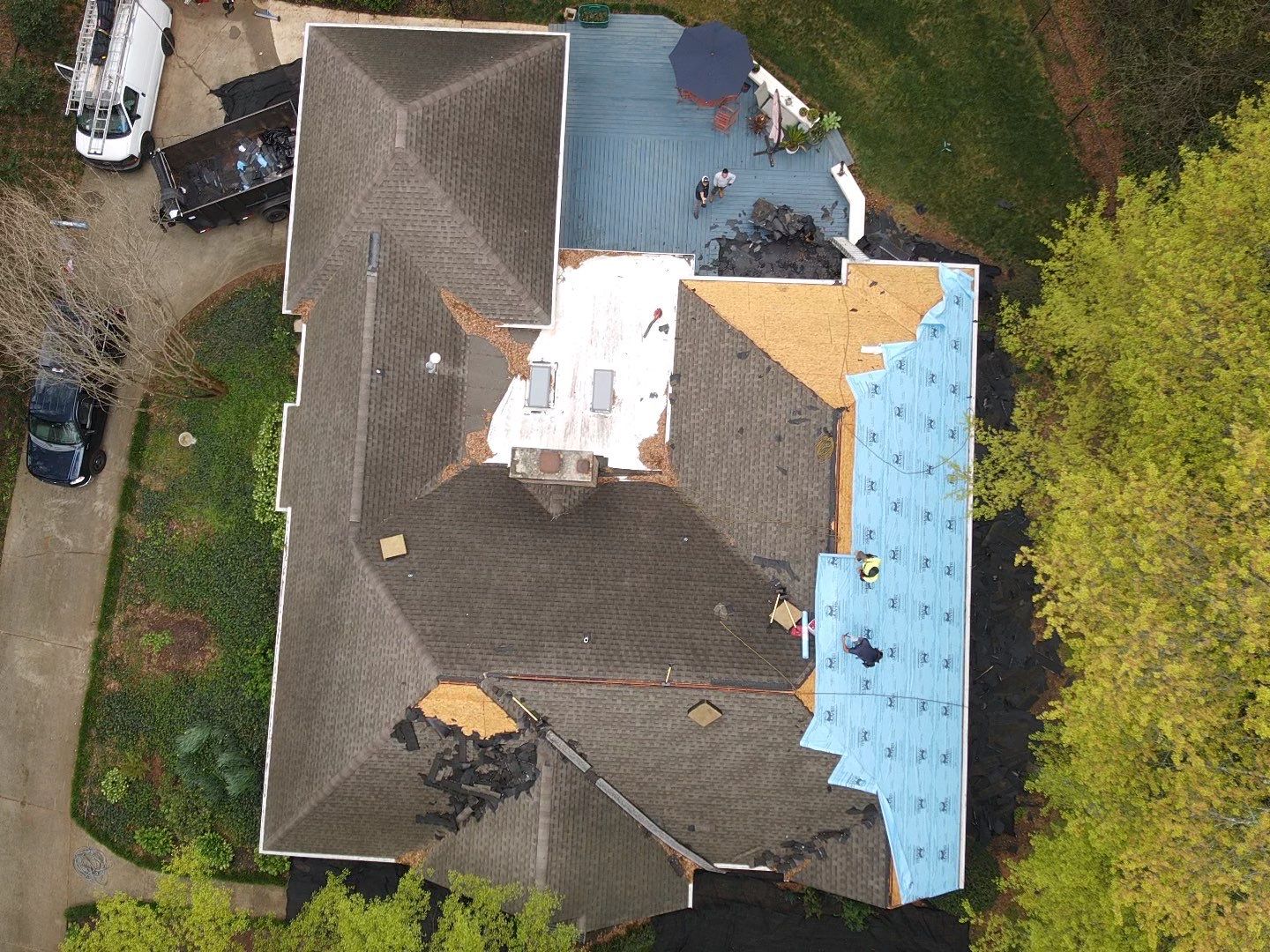 Spartanburg Residential Roof Replacement with Architectural Shingles and Skylights by Roofers LLC