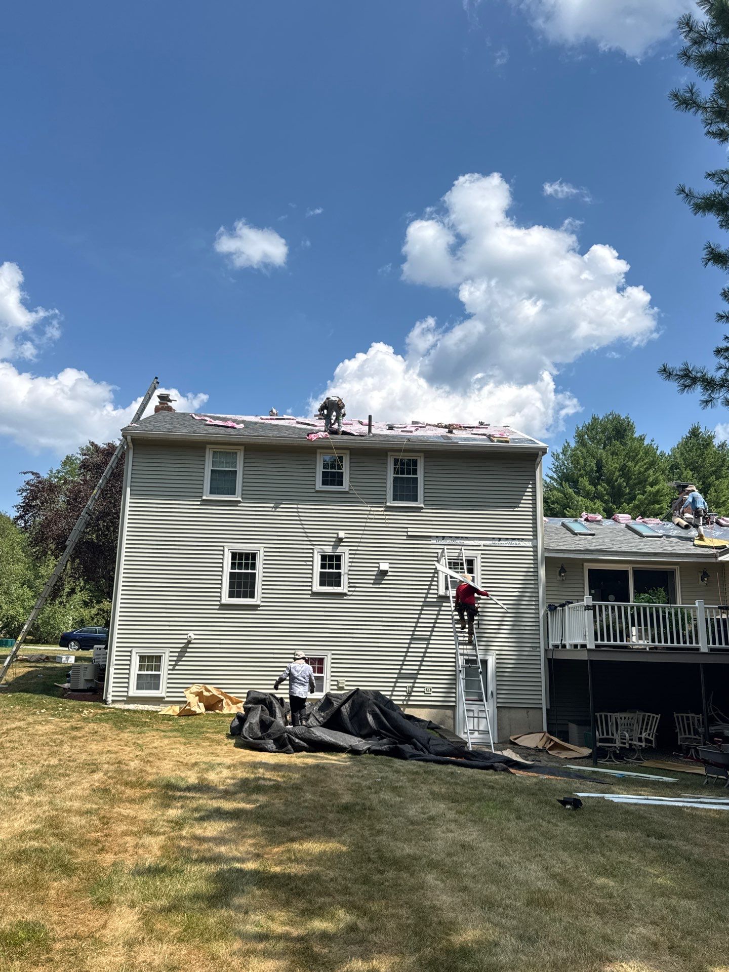 Complete Roof Replacement with Chimney Flashing, Gutter Guard System, and Vinyl Siding Repairs by Mighty Dog Roofing of Greater Middlesex County