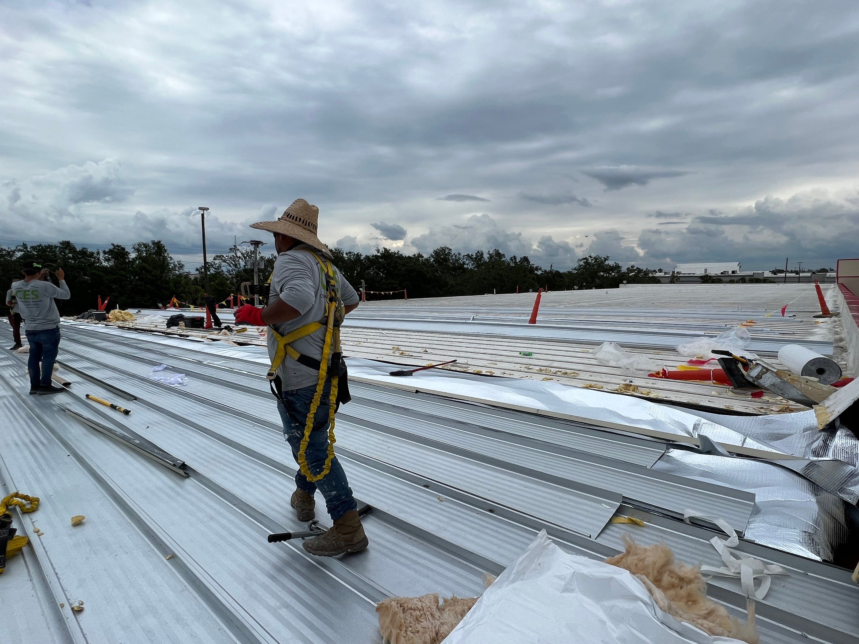 Commercial Metal Roof Replacement at Shopping Plaza in Port Charlotte by CES Roofing