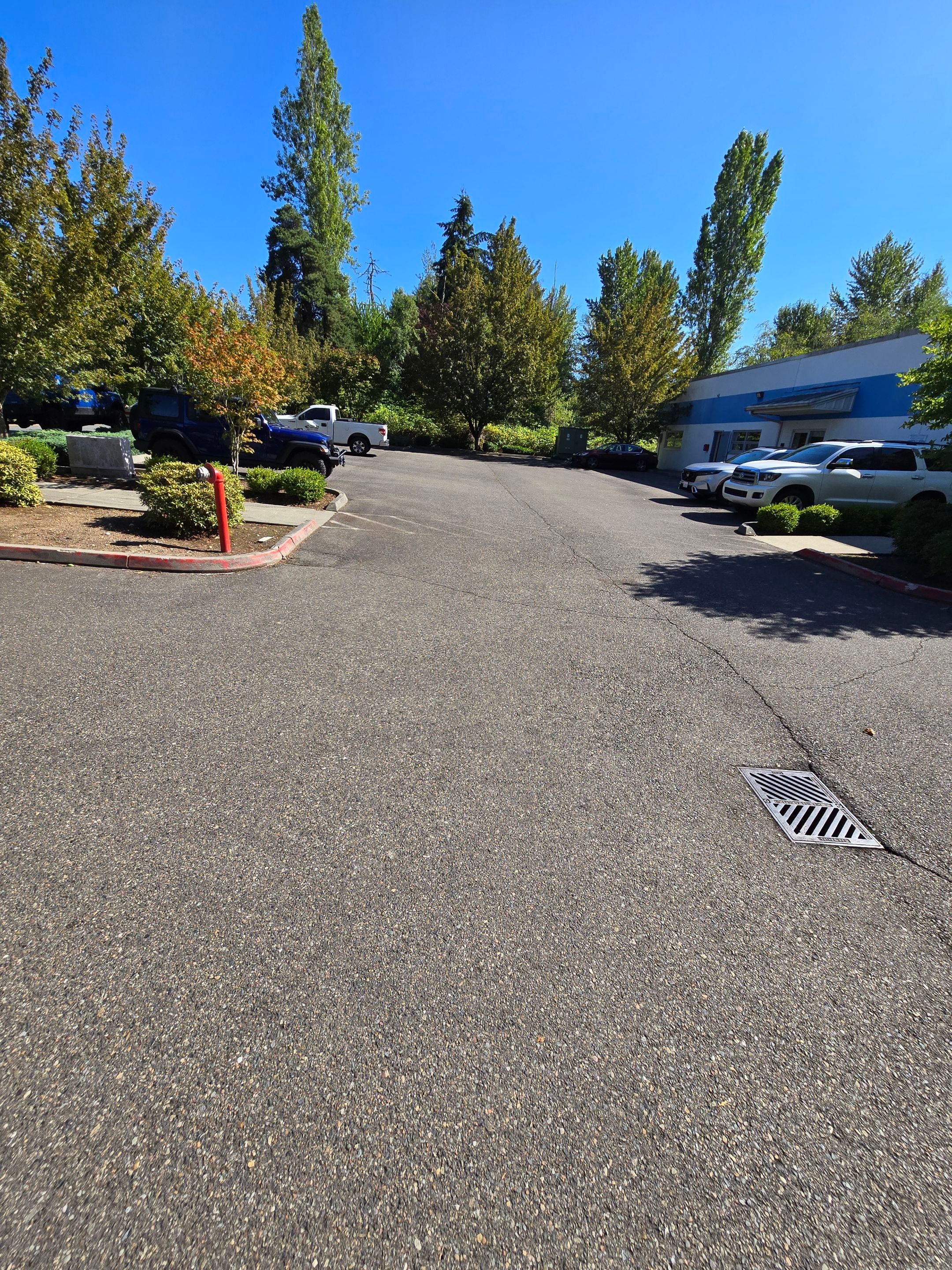 King Machine Business Parking Lot Sealcoat Overlay | Mukilteo by Jireh Asphalt & Concrete Inc 