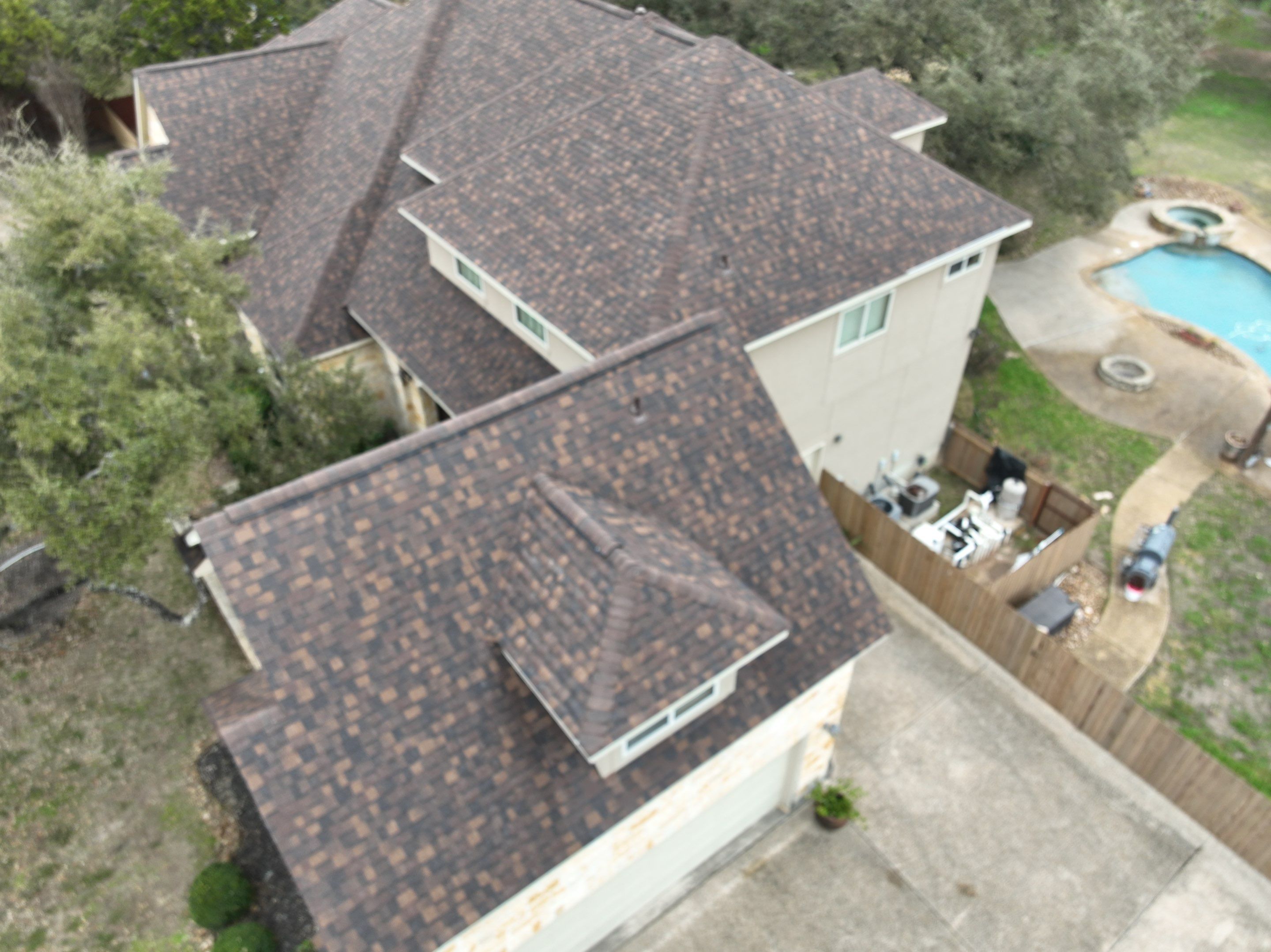 Residential Roof Replacement using 30 Year Laminate Shingles with High Profile Ridge by Premier Roofing and Contracting
