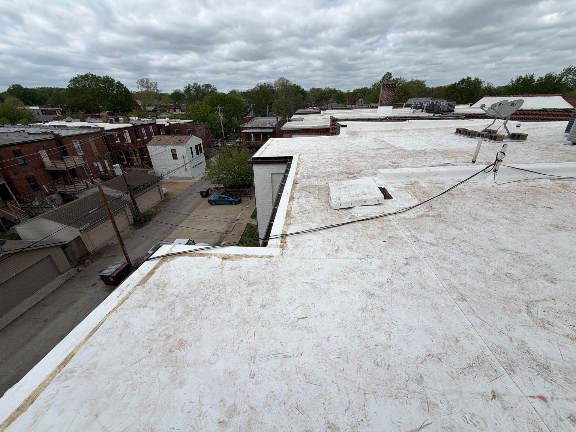 Multi-Family TPO Roof Installation and Masonry Repair in St. Louis by Acute Roofing And Exteriors