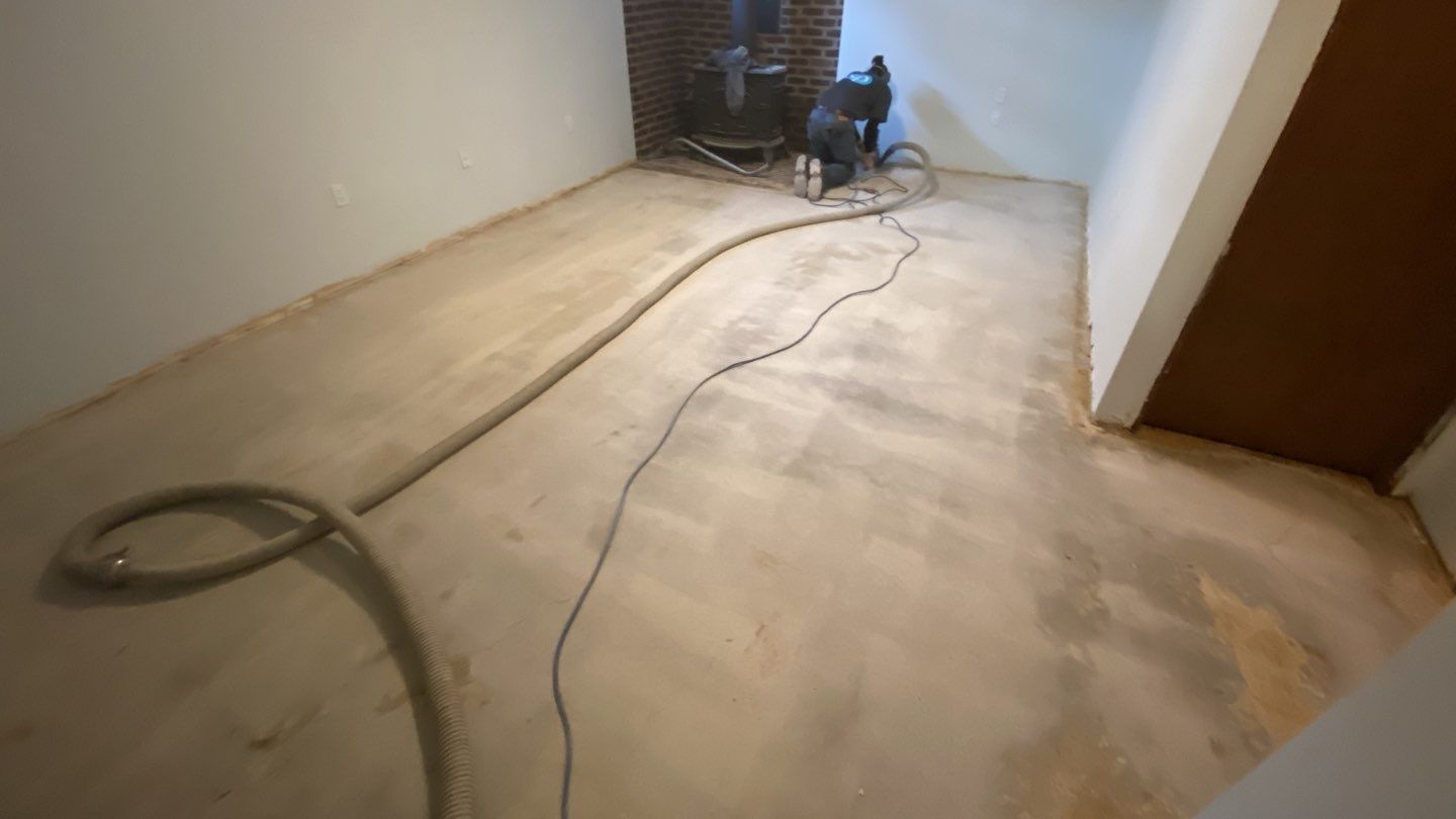 Basement using Tidalwave by Select Painting, Coatings & Garage Cabinets