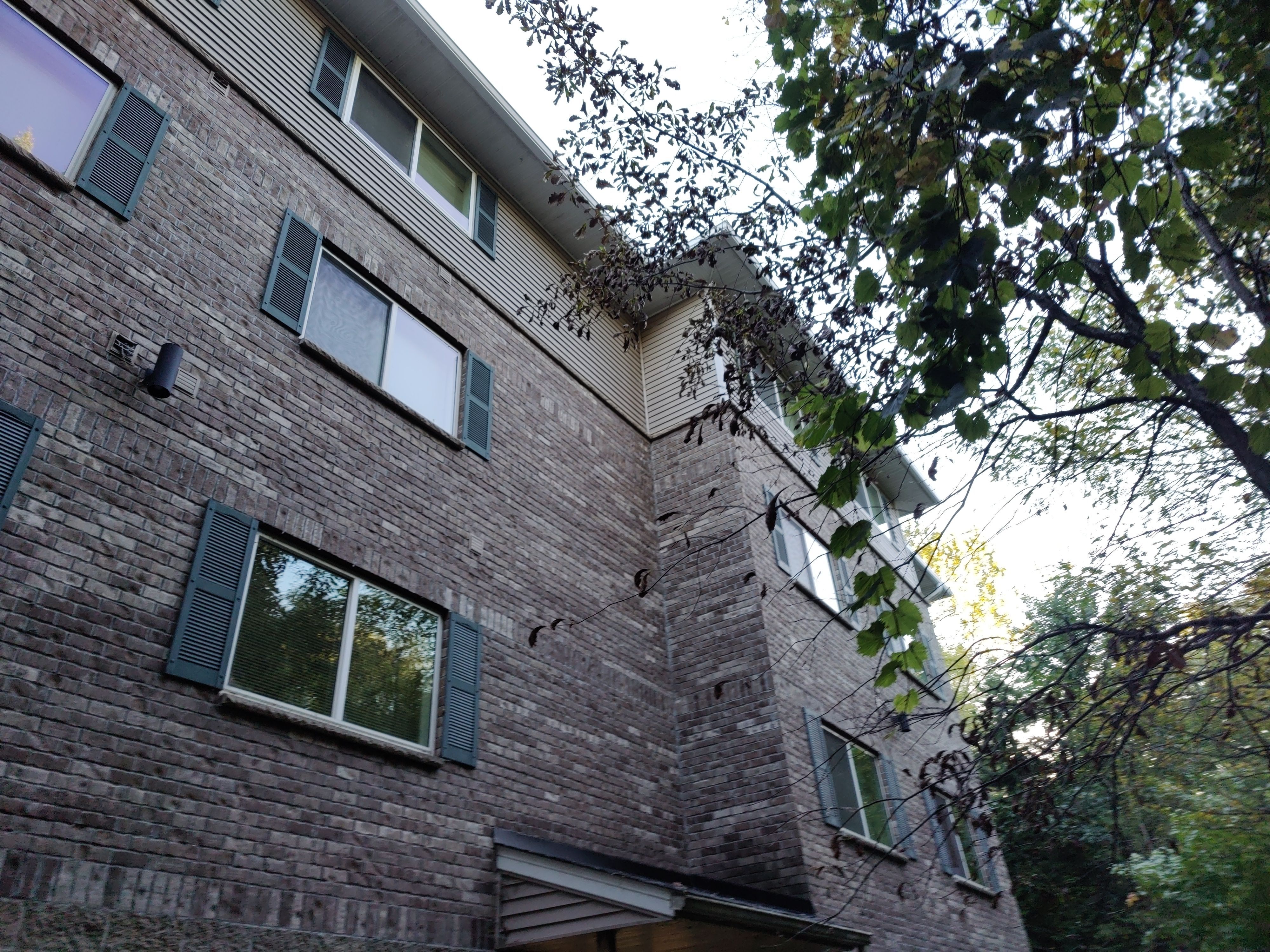 6" White Seamless gutters on Apartment Building- Prior Lake, MN by Next Level Seamless Gutters / Exteriors Inc.