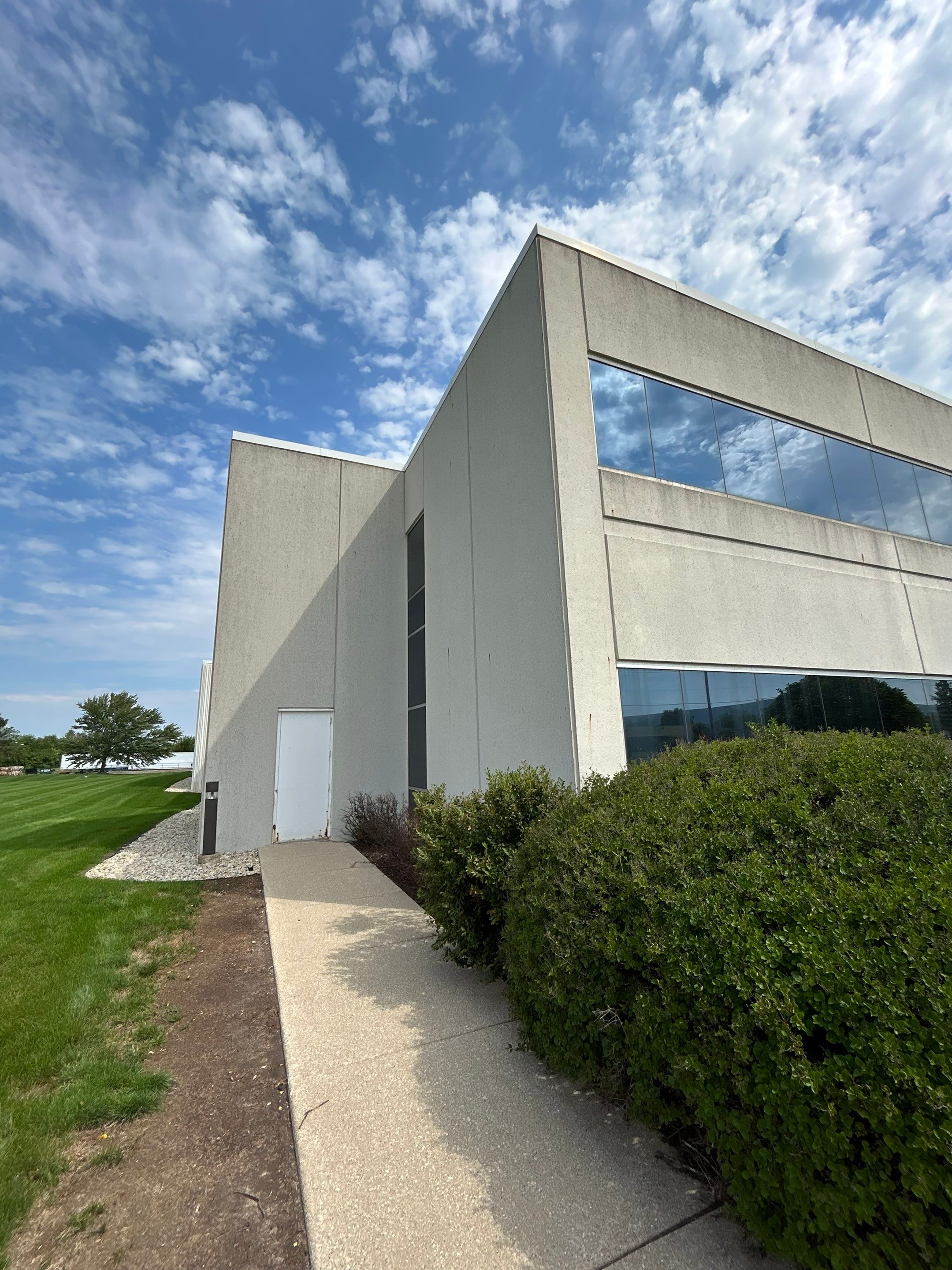 commercial pressure washing using Algaecide, soft wash soap by Northern Power Washing LLC.