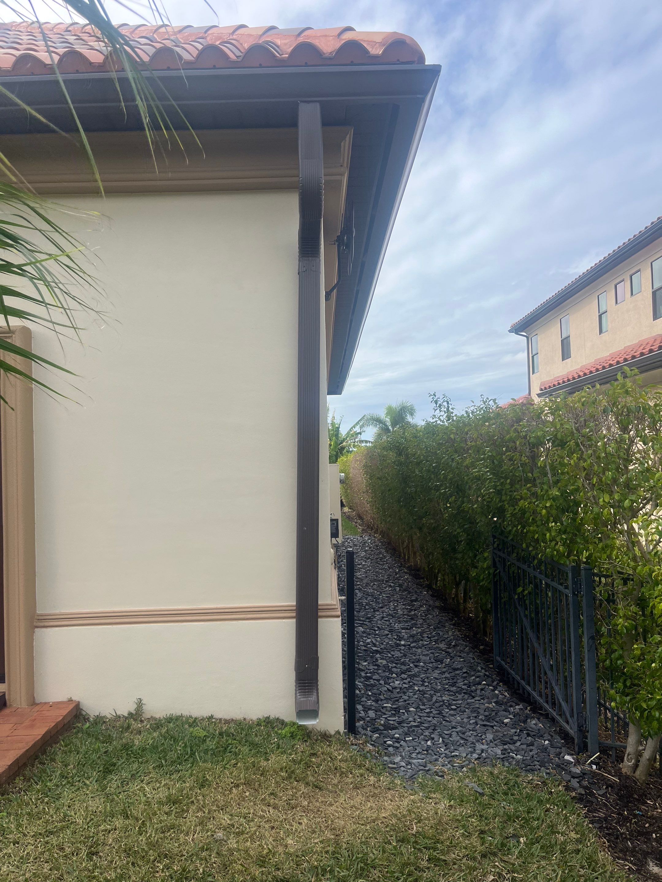 Musket Brown Seamless Gutters using Musket Brown Seamless Gutters in Cape Coral FL by Gutter Professors