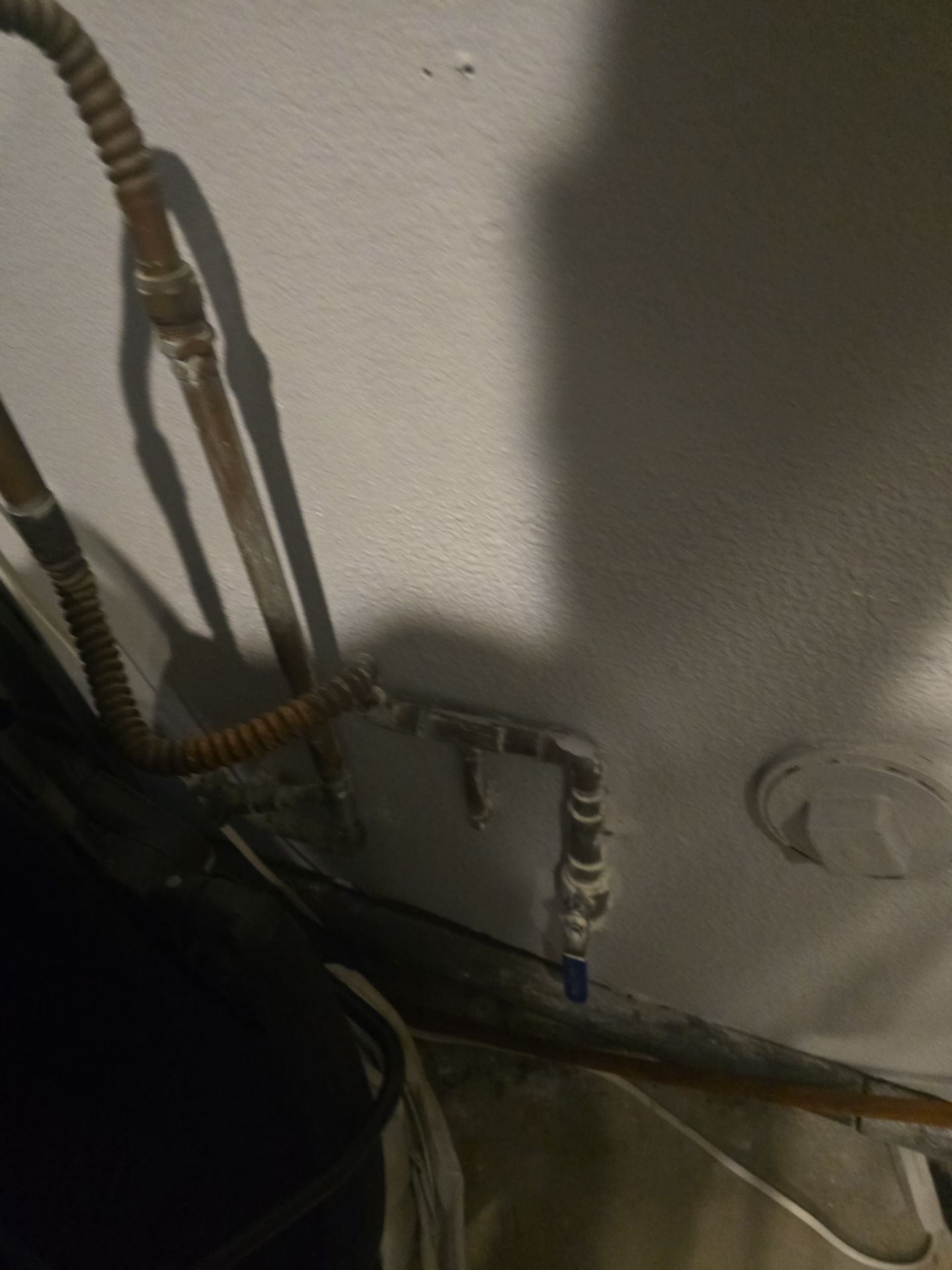 Inspecting Water Leak in Shower by Us Plumbing