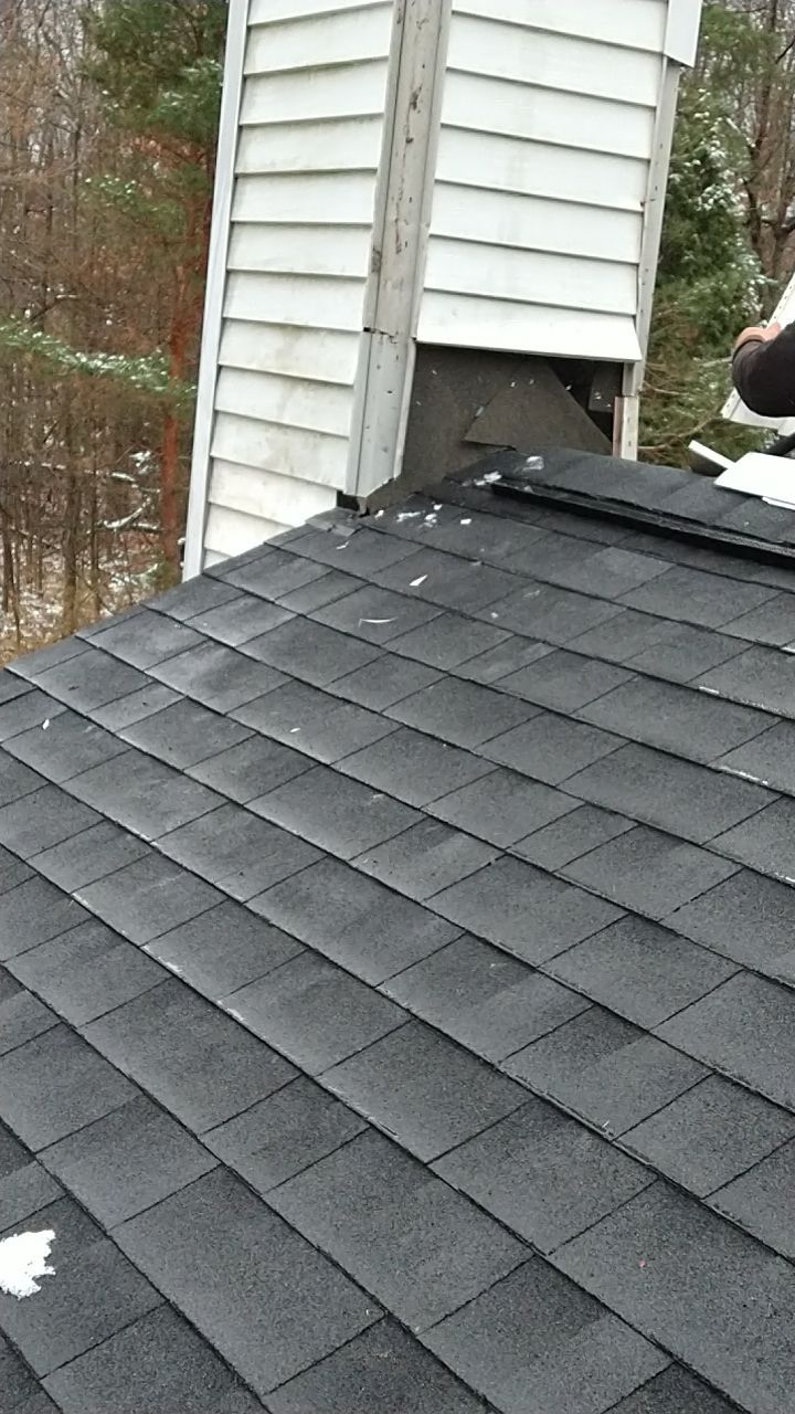James Hardie Siding  using James Hardie Board and Batten, White by Absolute Roofing and Construction