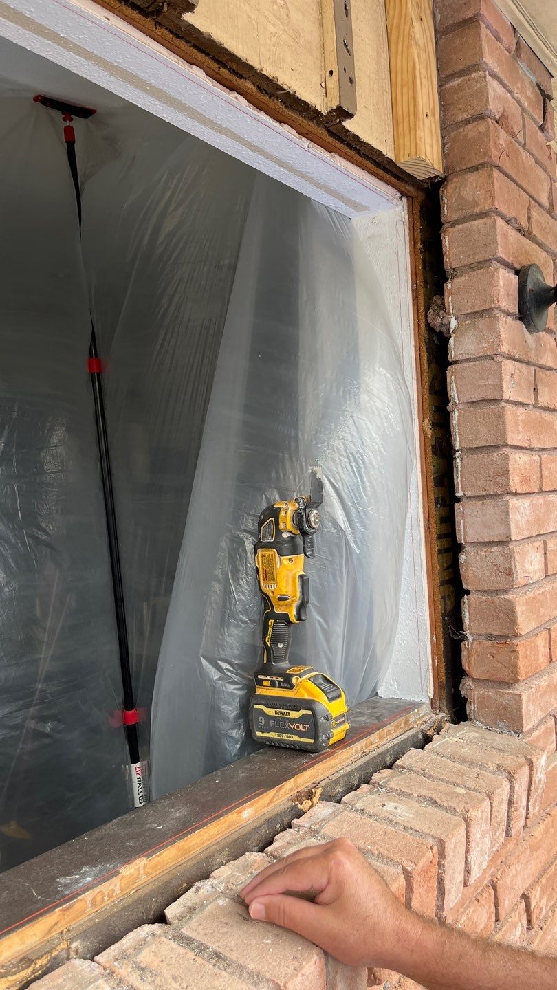 Windows in Brick with a Bay Window by Bayfront Roofing and Construction