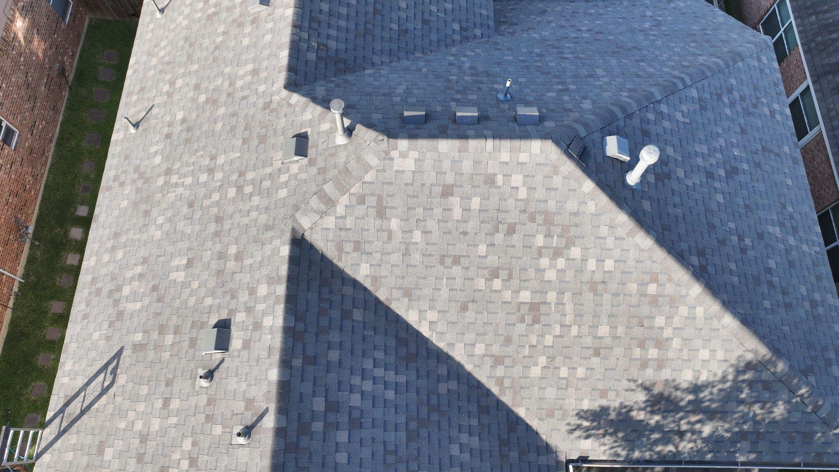 Storm-Damaged Roof Replaced — Houston, TX by PL Roofing & SB Roofing, LLC.