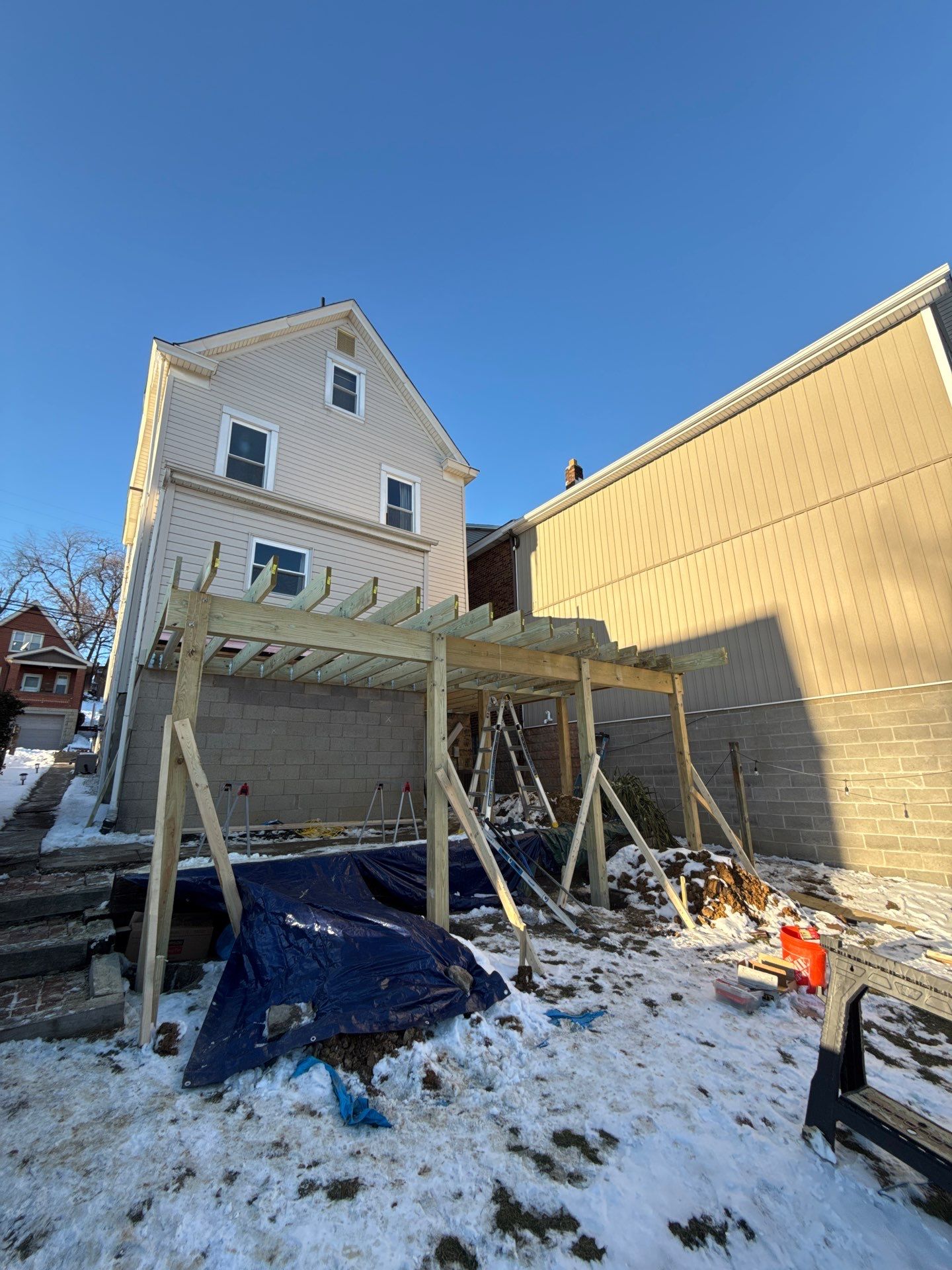 Deck and door by Cousins Roofing Siding & Decks
