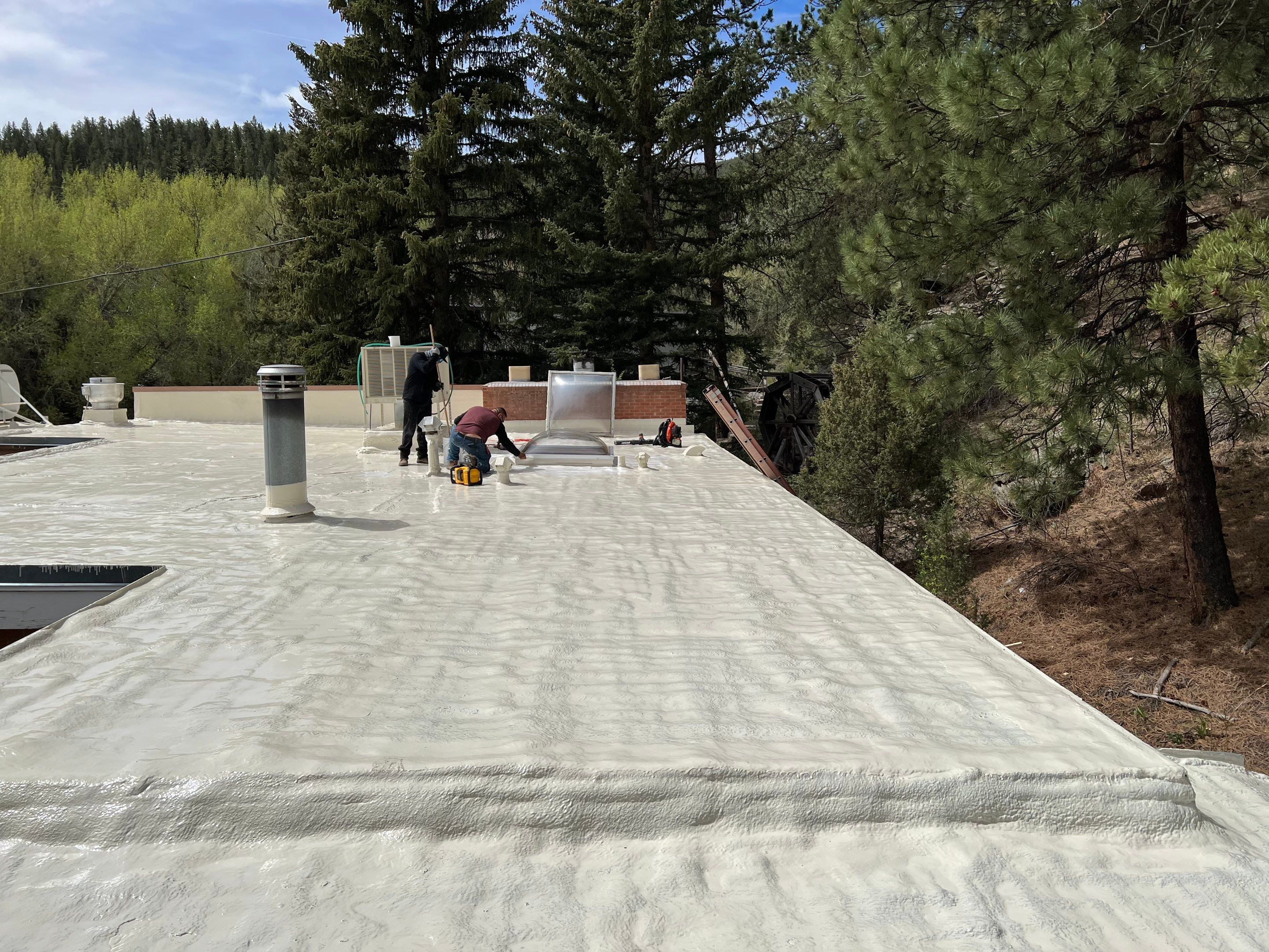 Commercial Roofing Installation using CASTAGRA ECODUR COATING by A to Z Roofing