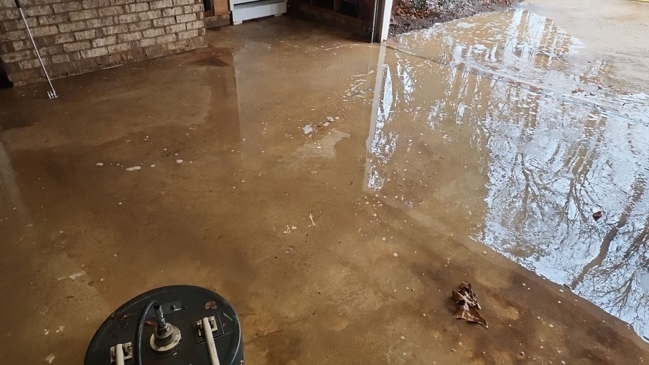 garage floor clean using cleaner by G&H Home Tech Pros LLC