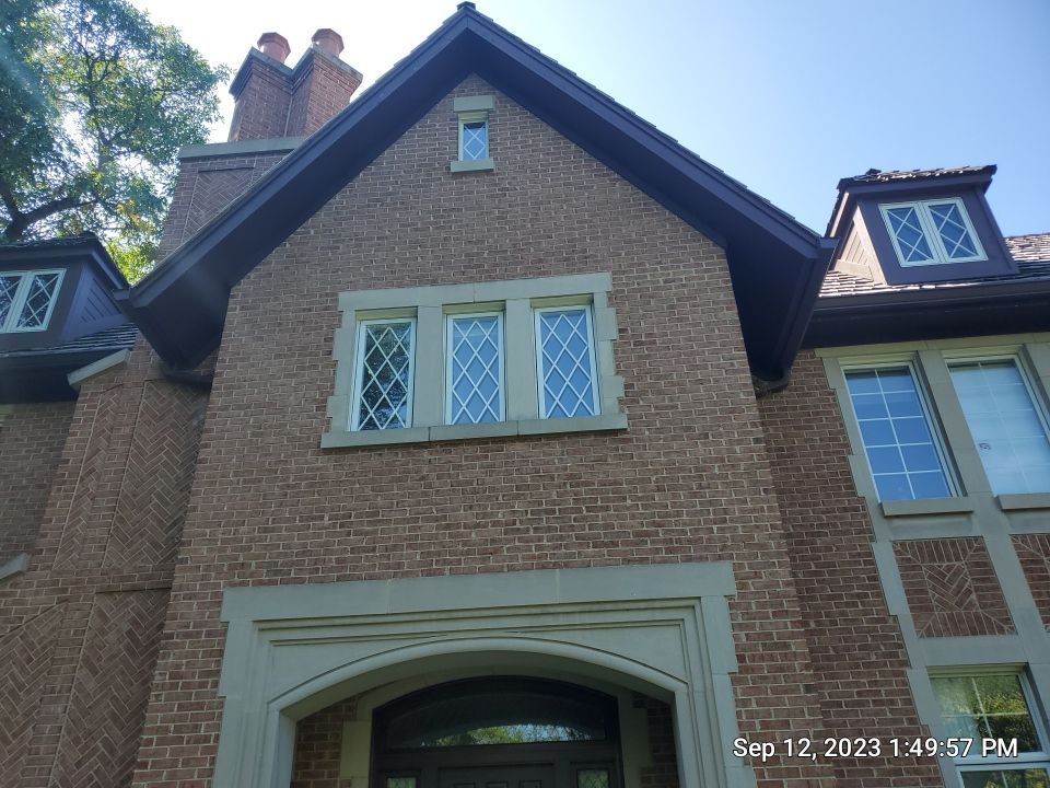 natural stone using Algaecide, soft wash soap by Northern Power Washing LLC.