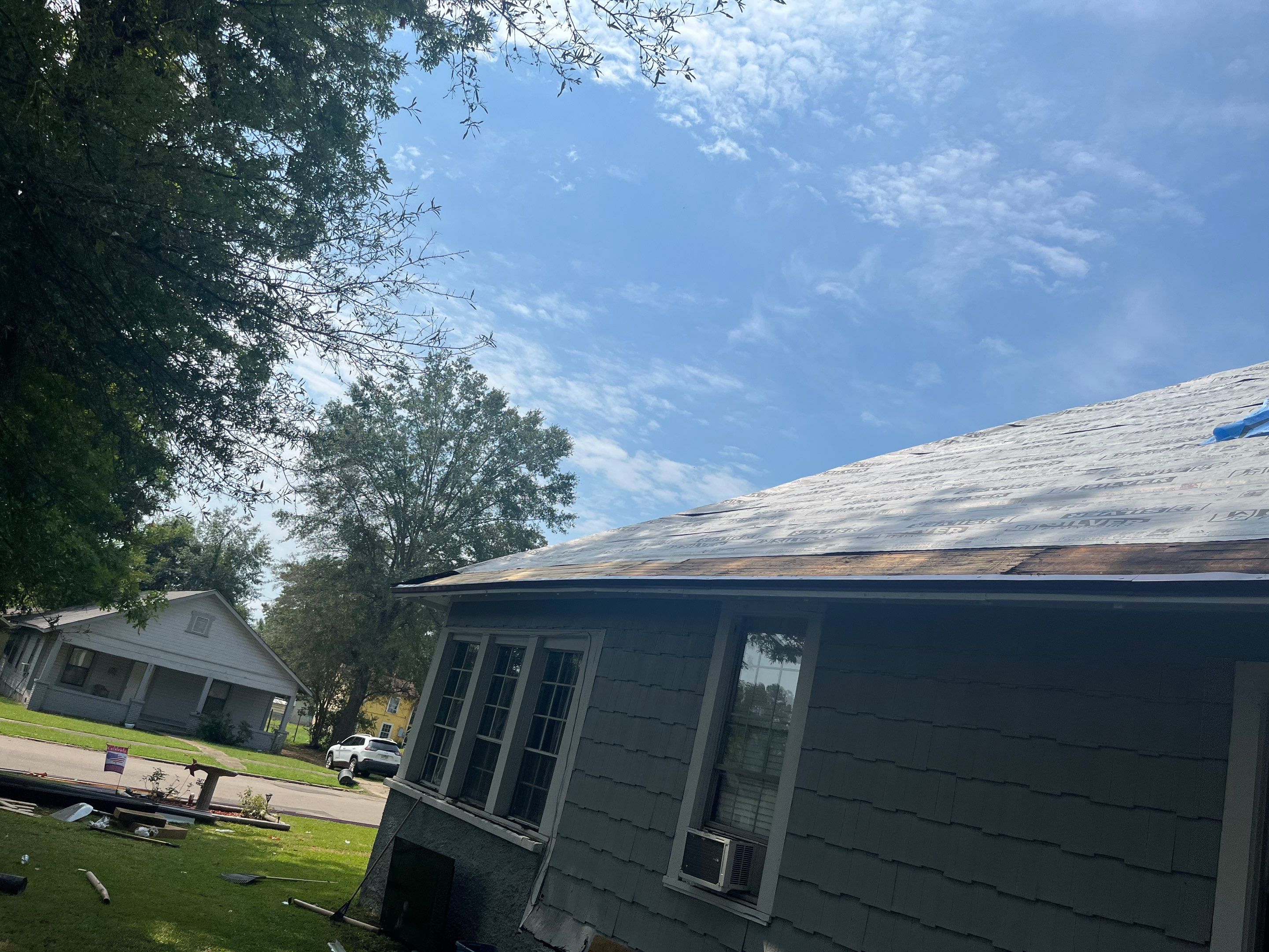 Residential Metal Roof Replacement using Reed's Metals: Colored Residental Panel (Burgundy) by Hostetler Roofing