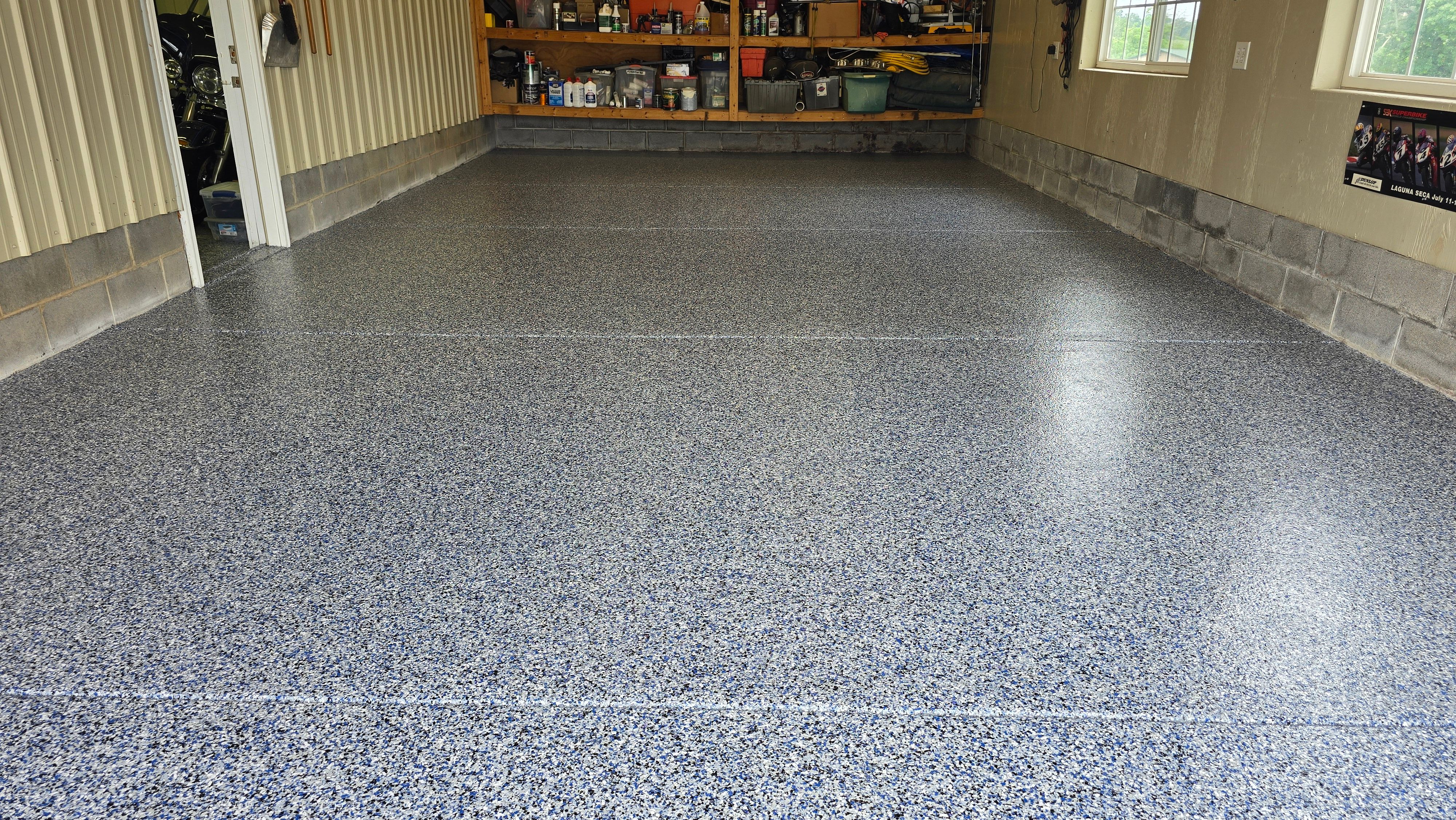 Two garages completed using Shoreline and Midnight by Elite Floor Solutions