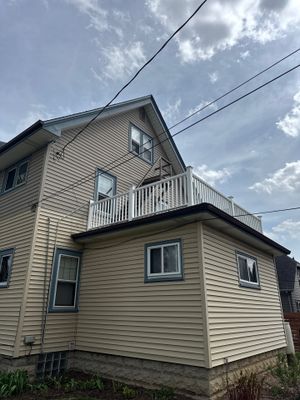 Exterior Porch Restoration and Privacy Fence Staining in Wauwatosa