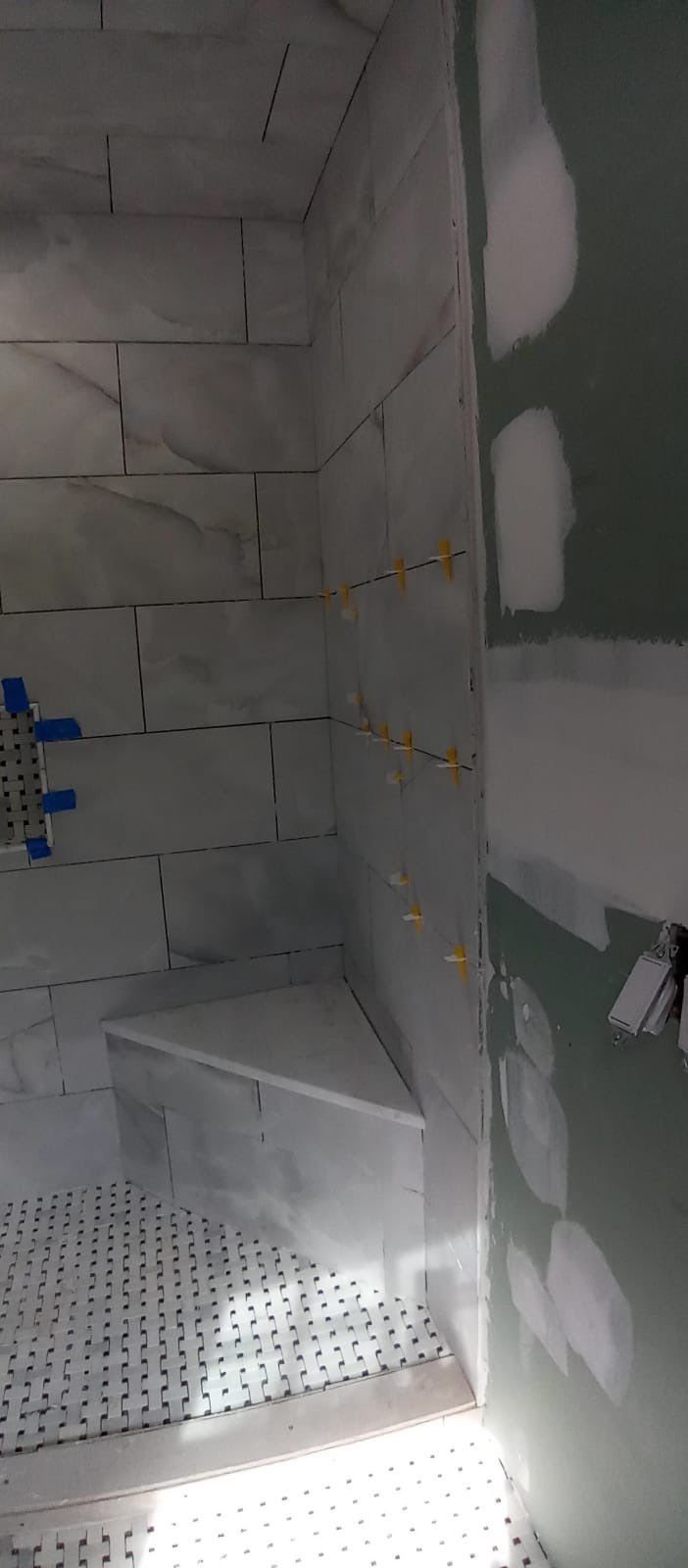 Bathroom Remodel using Tile by Home Concepts Construction