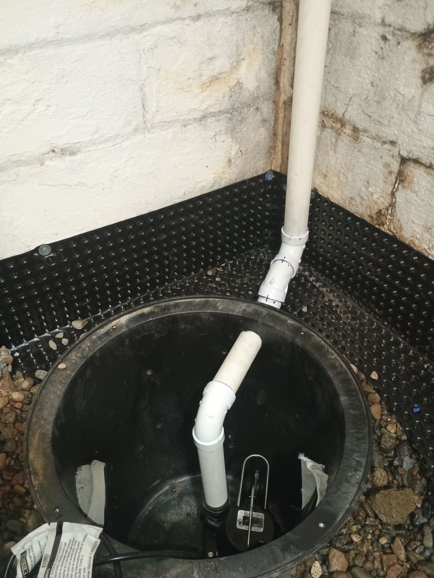 Sump Pump & Buried Discharge in Northeast Minneapolis by Waterproofing Northeast