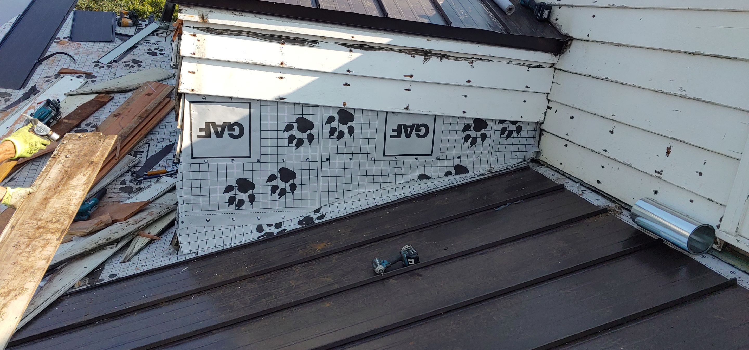 Residential Roofing Installation using Standing seam metal roofing system by Straight Edge Roofing Inc