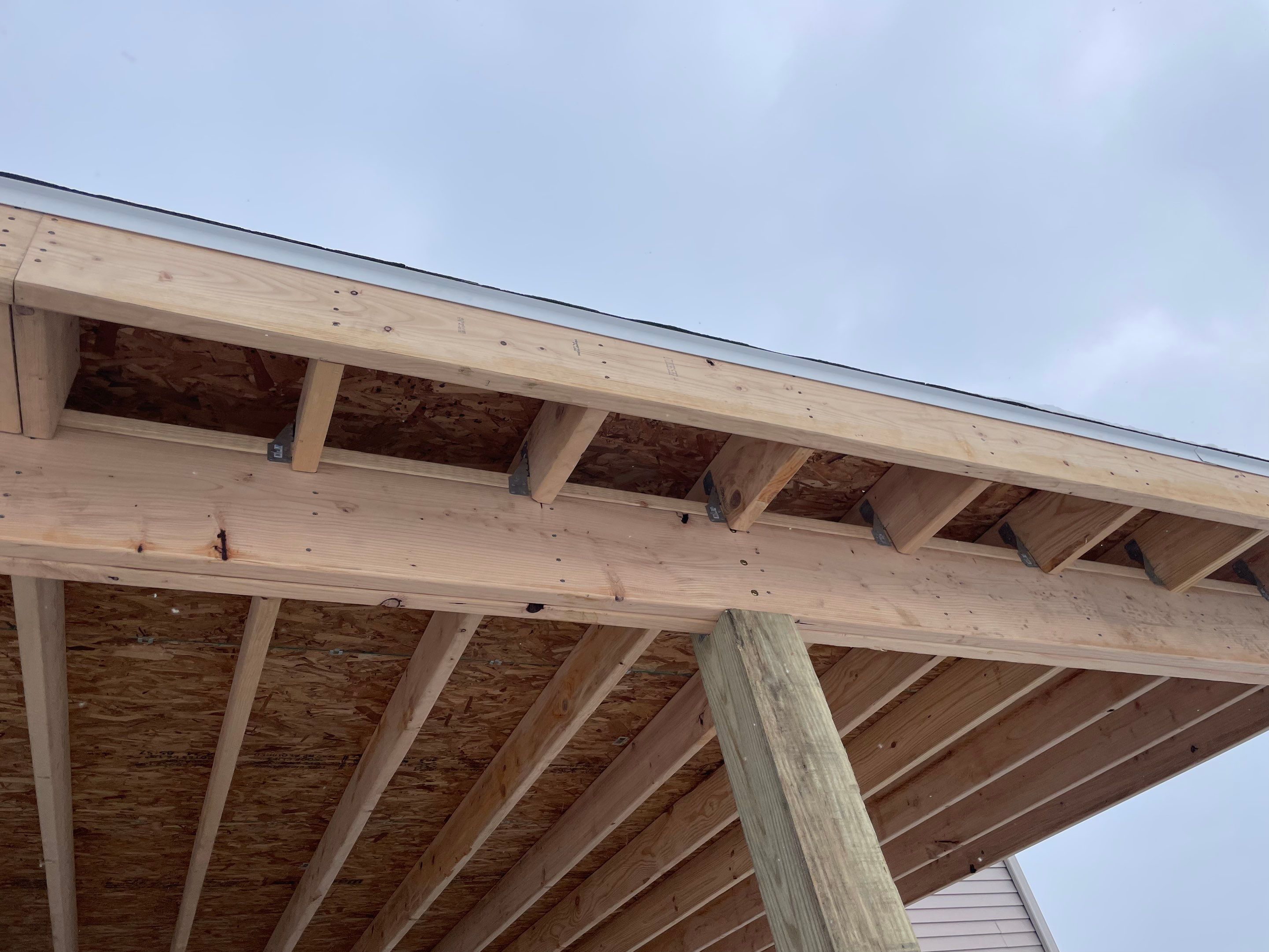 PATIO ROOF INSTALLATION using Treated Lumber by Avalon Roofing and Exteriors