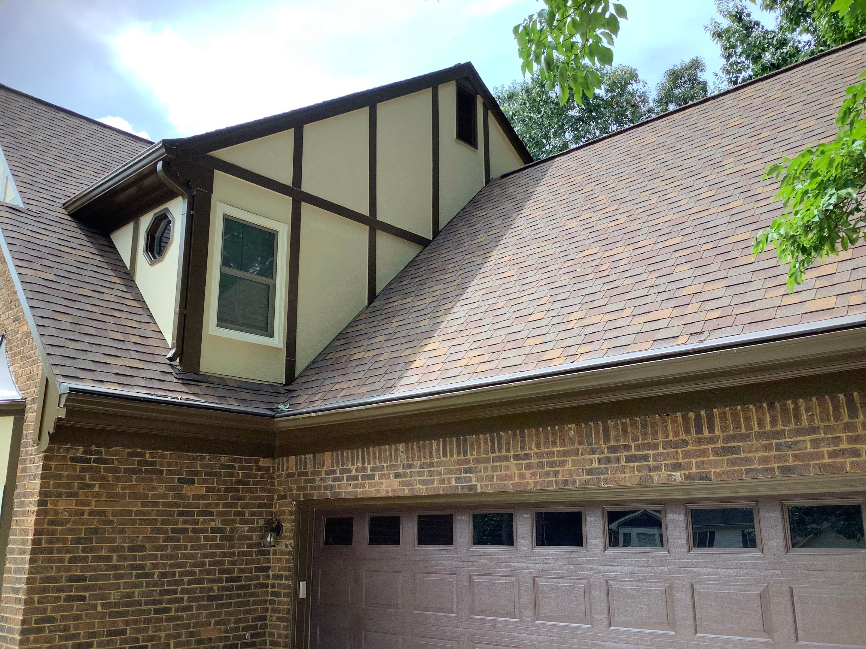 Complete Exterior Painting and Trim Refresh for Roswell Tudor Home by Swift Home Renovations