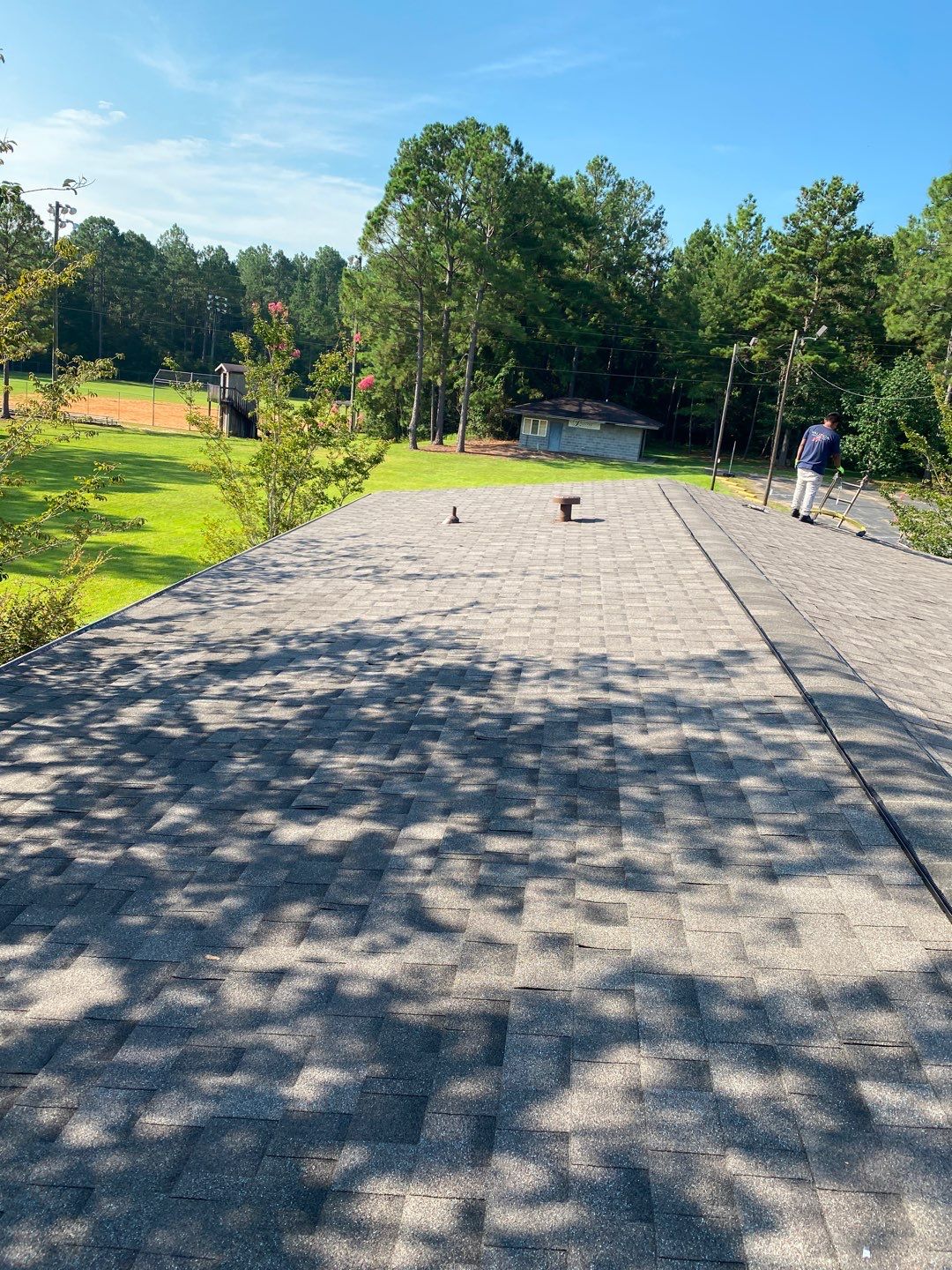 Commercial Roofing Installation using Roof Replacement by American Roofing & Construction LLC