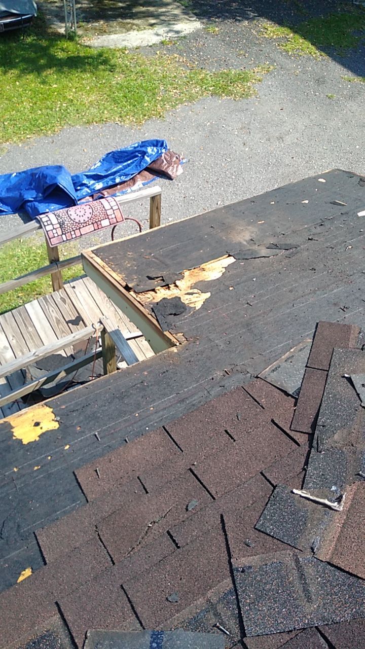 Residential Roofing Installation using Roof Replacement by American Roofing & Construction LLC