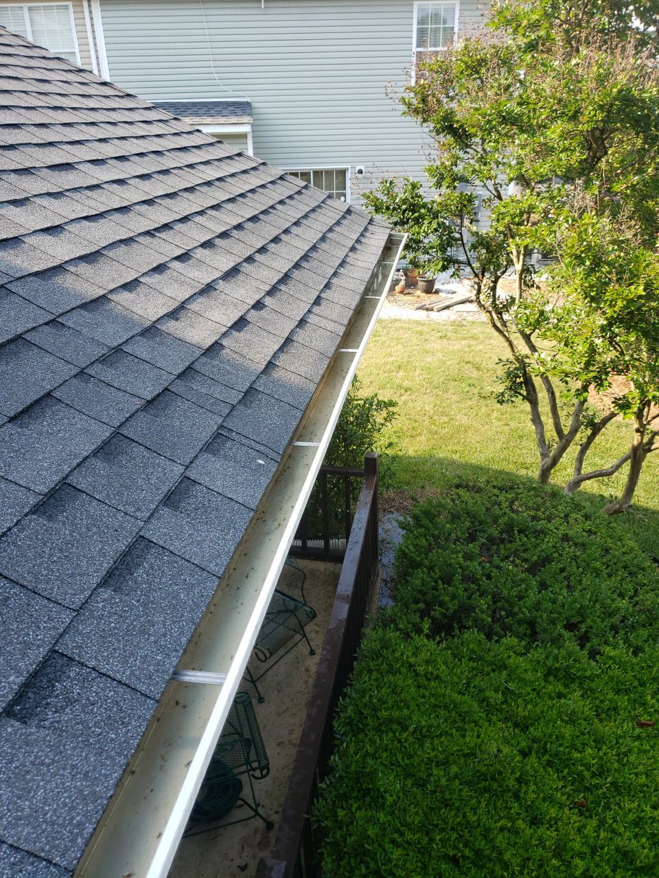 Gutter Cleaning using water by Power Wash Masters LLC